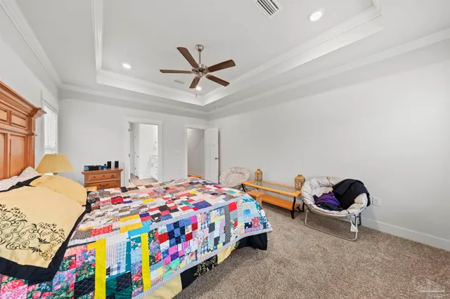 a spacious bathroom with a double vanity sink a mirror and shower