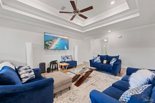 a living room with furniture or couch and a couch