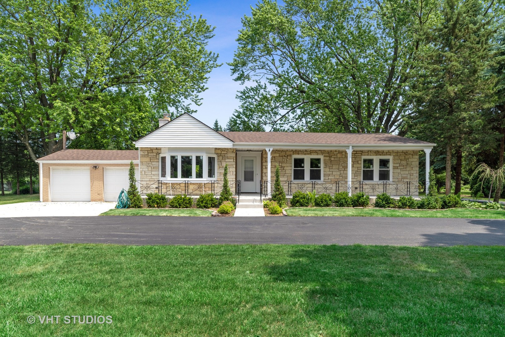 307 North Westgate Road Mount Prospect, IL 60056 - Photo 1 of 17 a front view of house with yard and green space