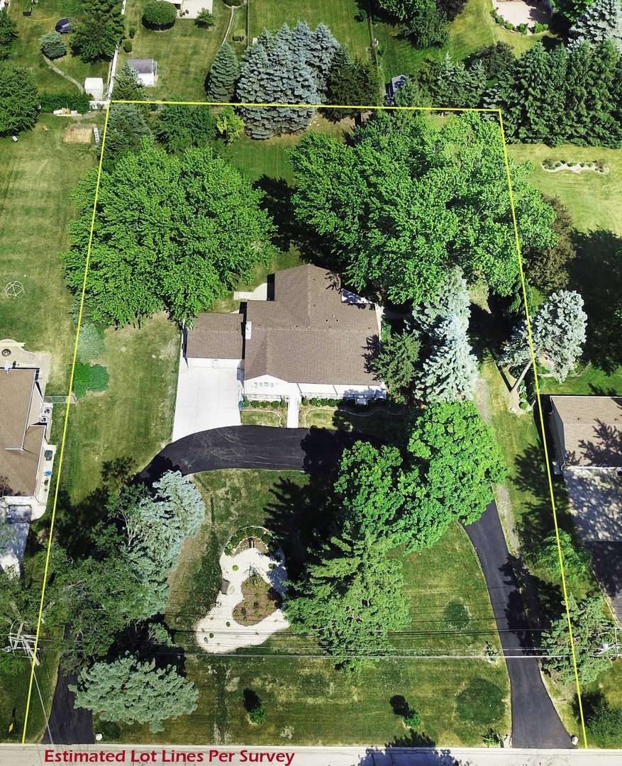 307 North Westgate Road Mount Prospect, IL 60056 - Photo 2 of 17 an aerial view of a house with a yard and garden