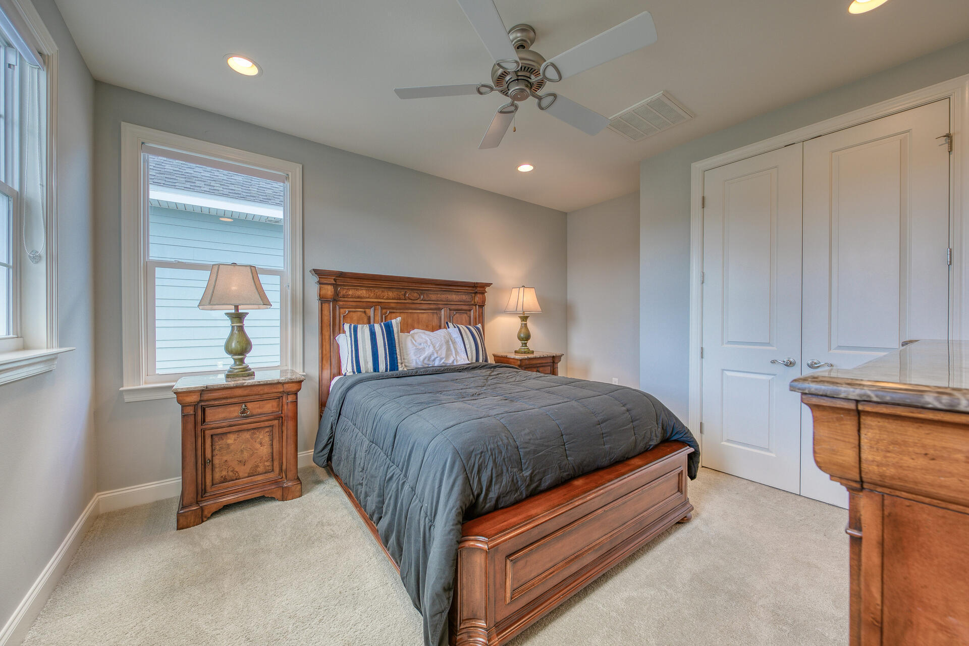 103 Chapman Street Santa Rosa Beach, FL 32459 - Photo 23 of 29 a spacious bedroom with a bed and a dresser