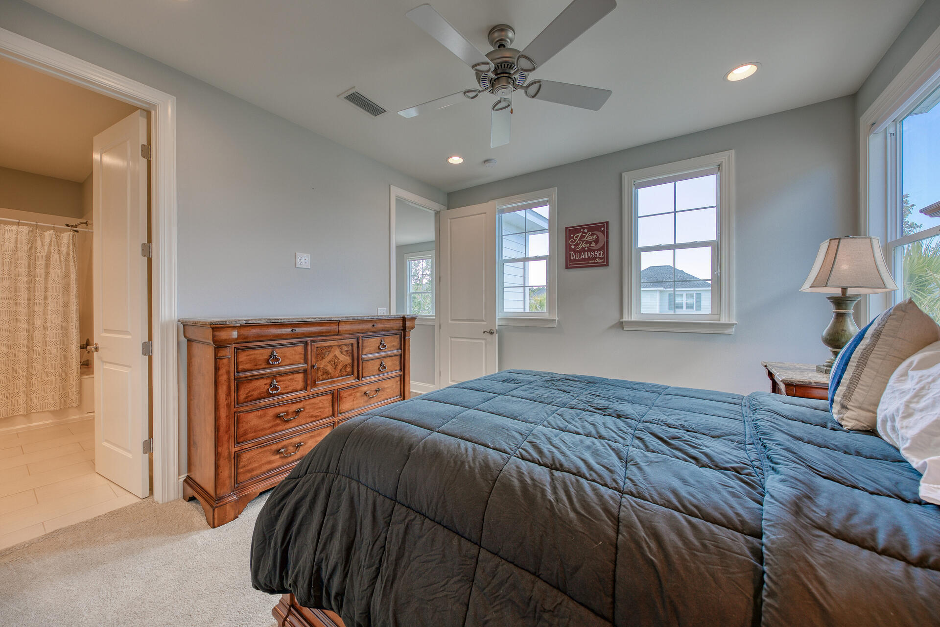 103 Chapman Street Santa Rosa Beach, FL 32459 - Photo 24 of 29 a bedroom with a bed dresser and a window