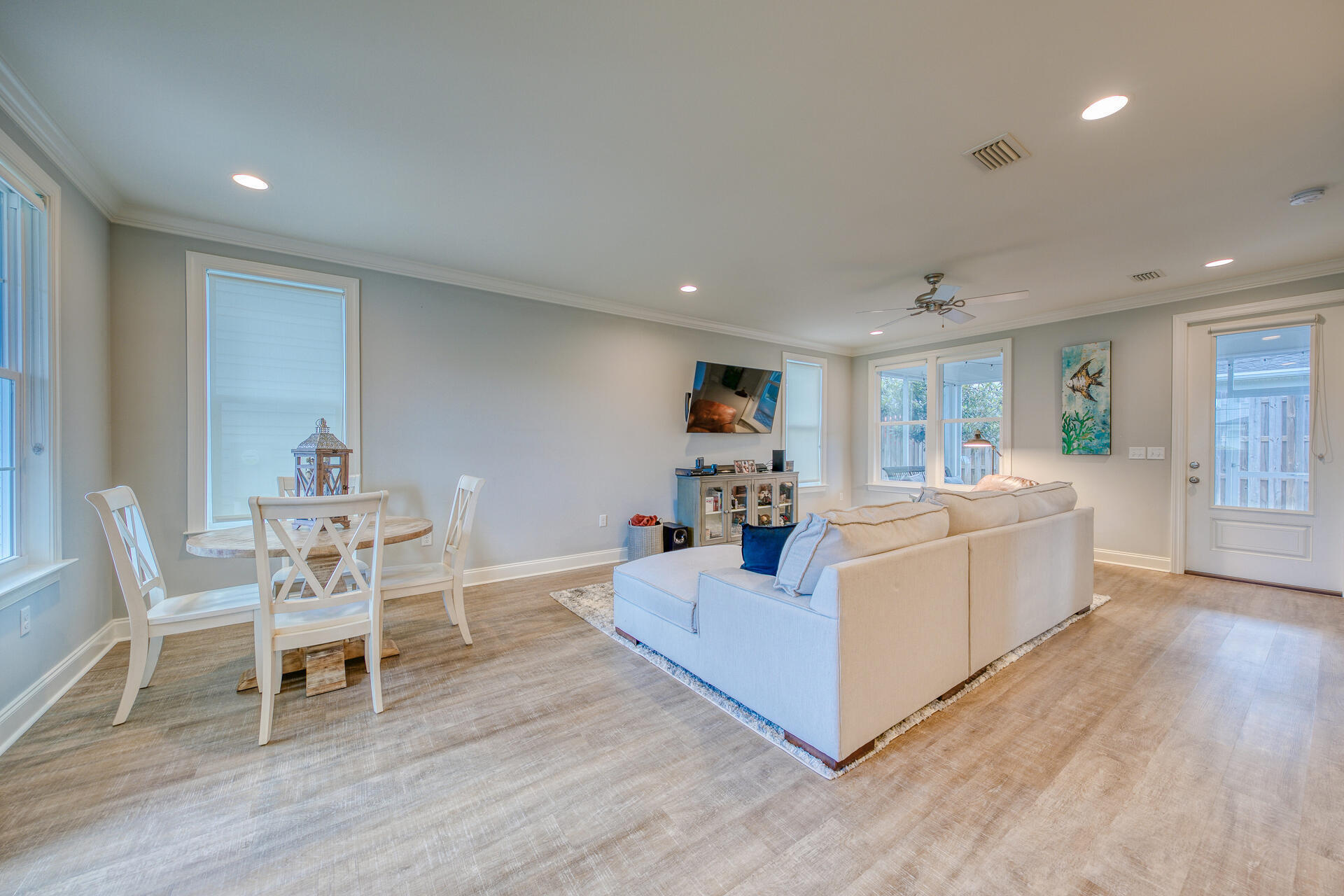 103 Chapman Street Santa Rosa Beach, FL 32459 - Photo 5 of 29 a living room with furniture and a wooden floor