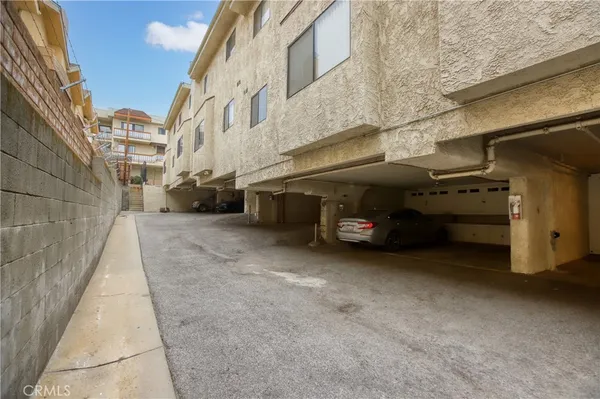 a view of a street with cars
