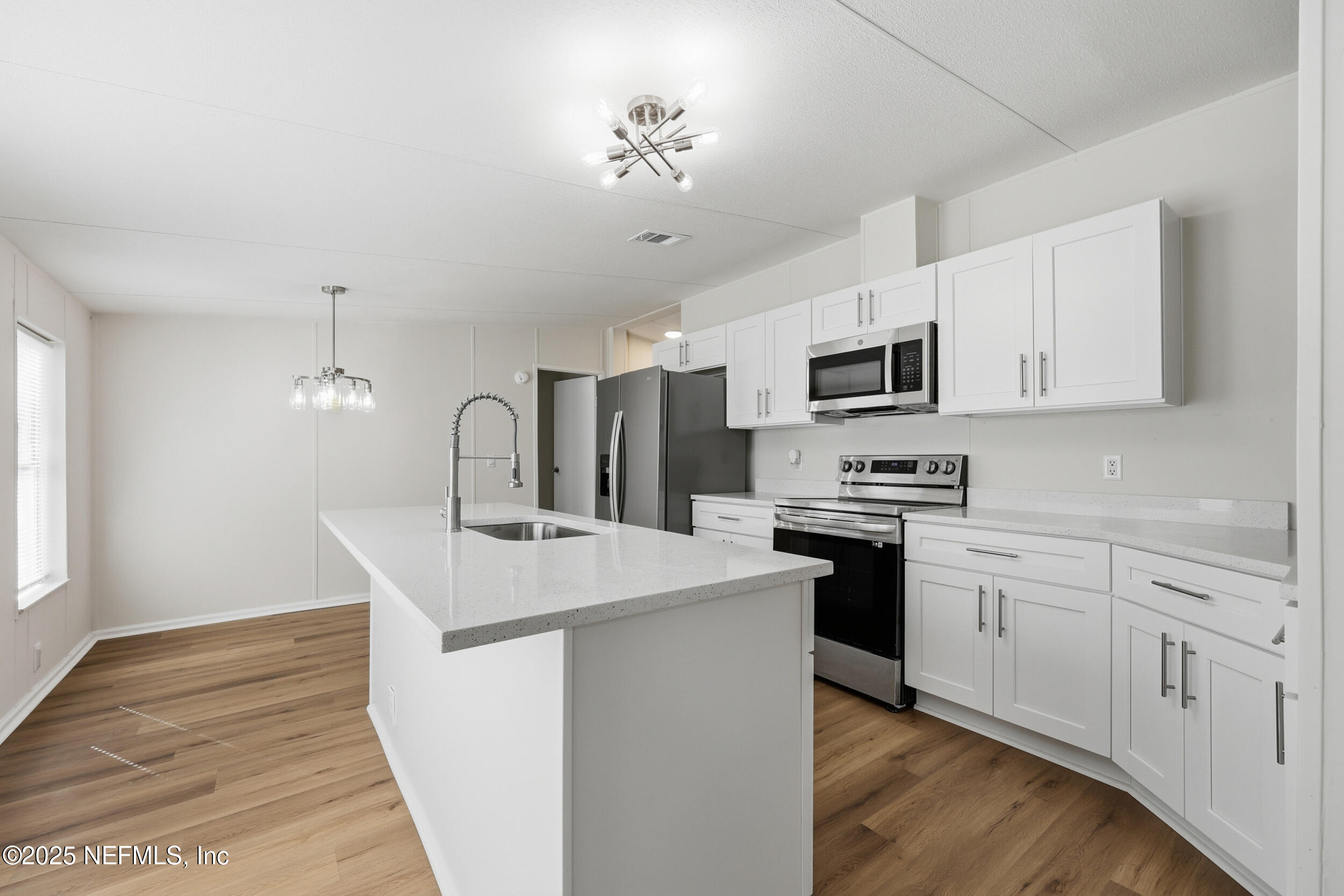 5671 Southwest 56th Way Lake Butler, FL 32054 - Photo 13 of 45 Kitchen to Dining Area