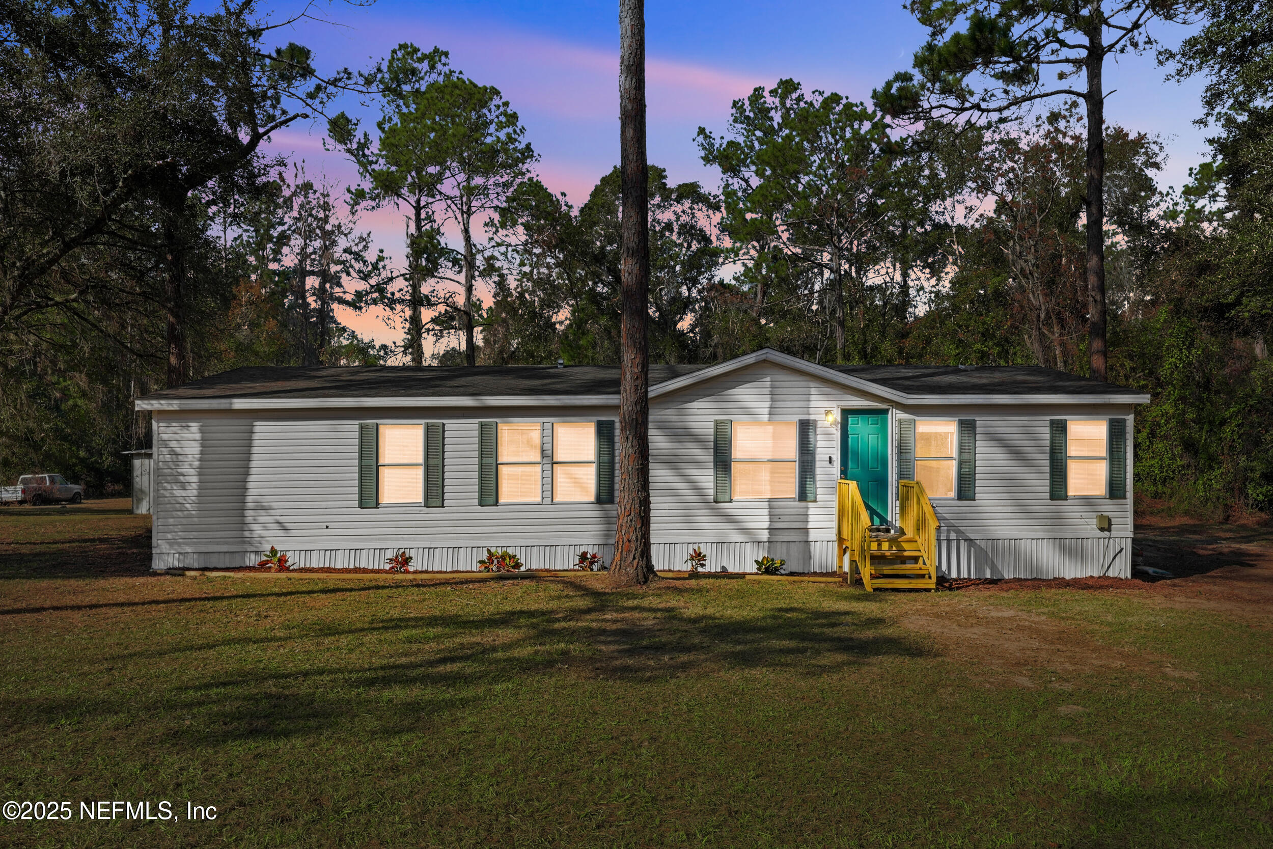 5671 Southwest 56th Way Lake Butler, FL 32054 - Photo 2 of 45 Front Exterior Twilight