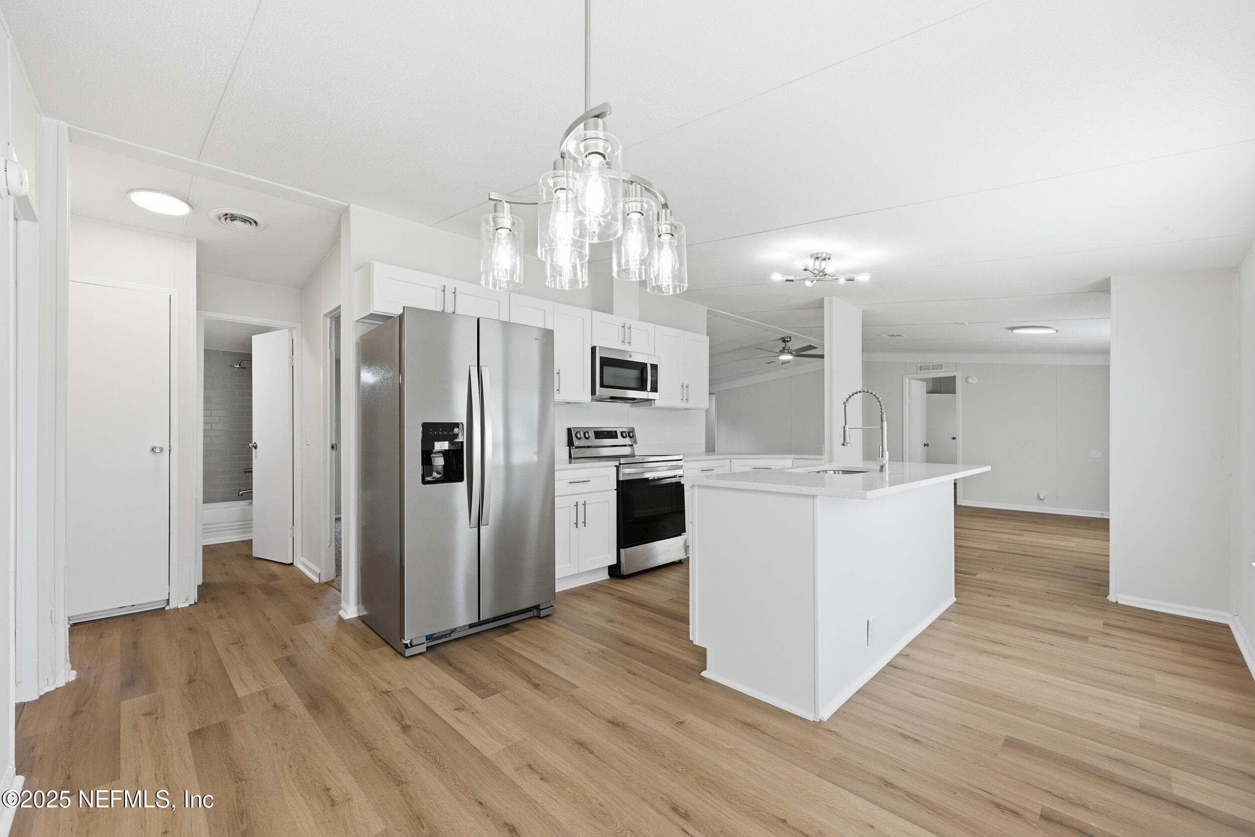 5671 Southwest 56th Way Lake Butler, FL 32054 - Photo 22 of 45 Dining Area to Kitchen
