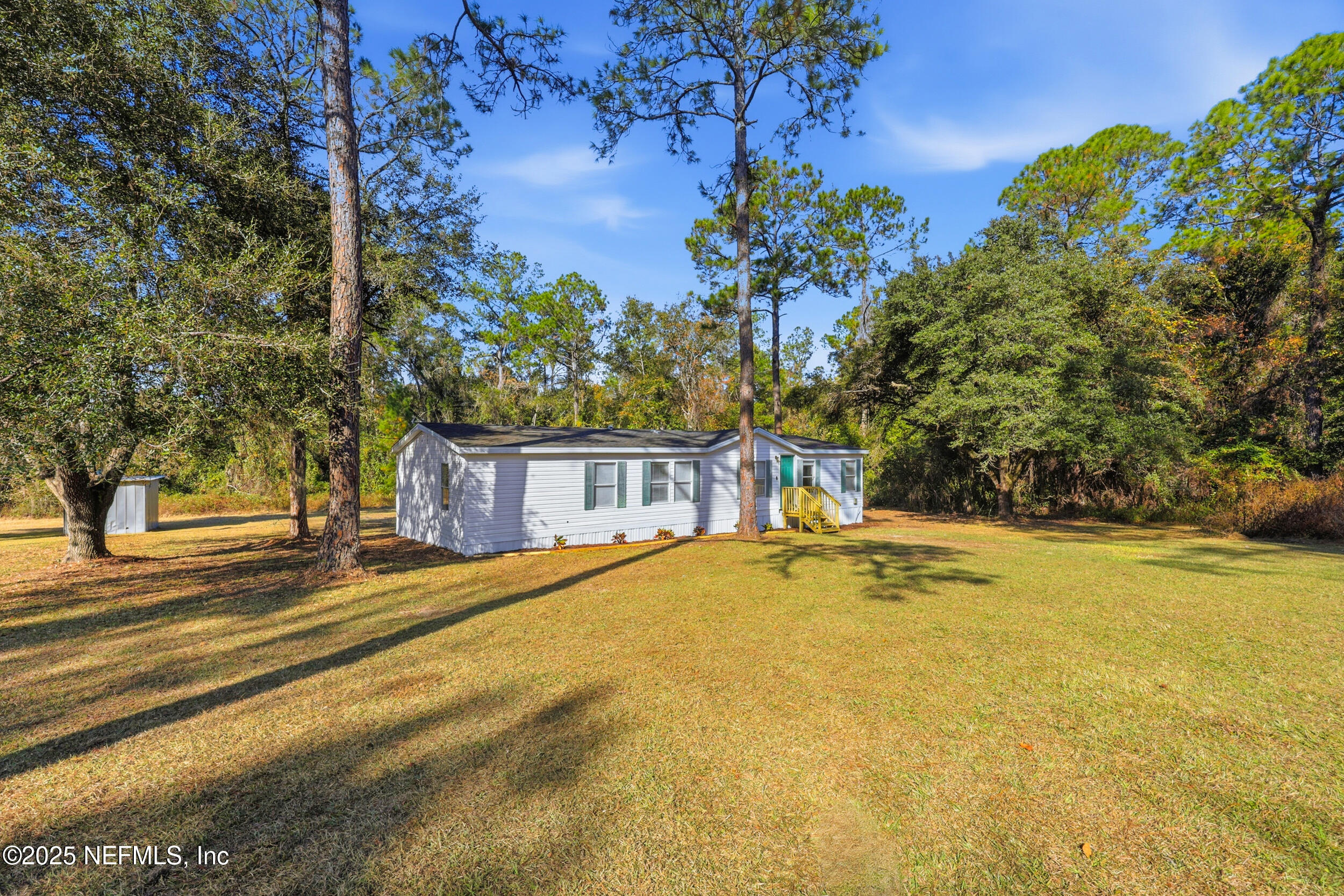 5671 Southwest 56th Way Lake Butler, FL 32054 - Photo 6 of 45 Front Angled View from Left