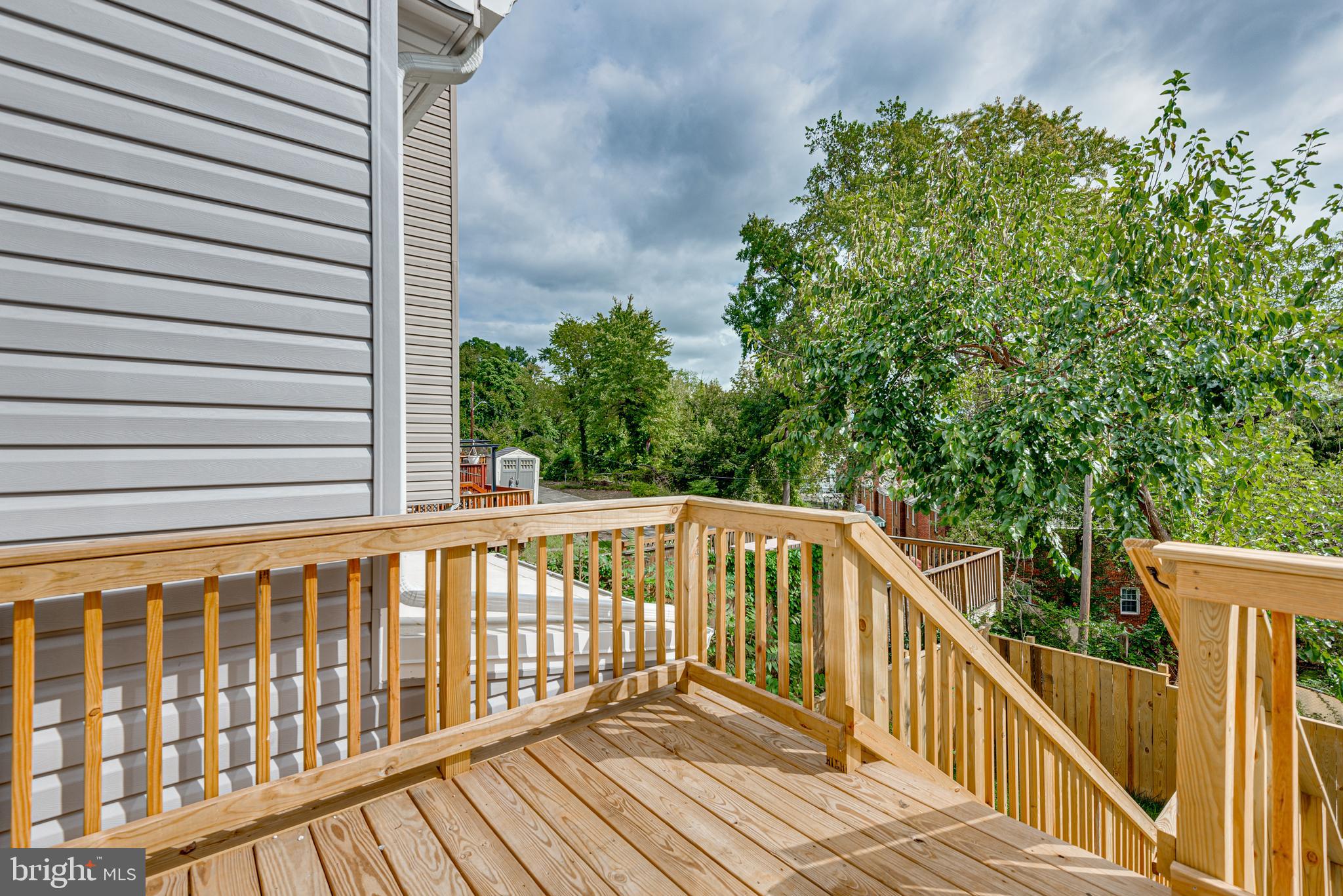 3830 First Street Southeast Washington, DC 20032 - Photo 16 of 49 a view of balcony with wooden floor