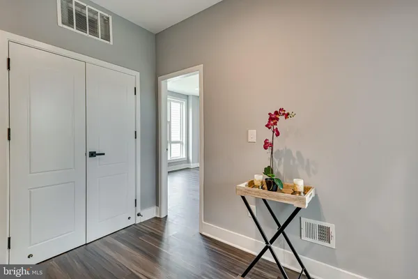 a room that has a table and chairs in it