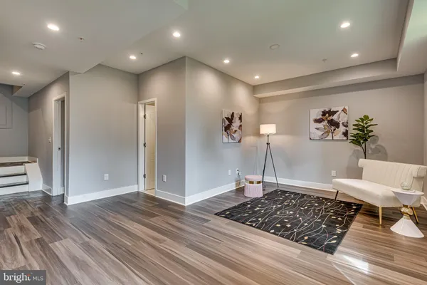 a view of a livingroom with wooden floor