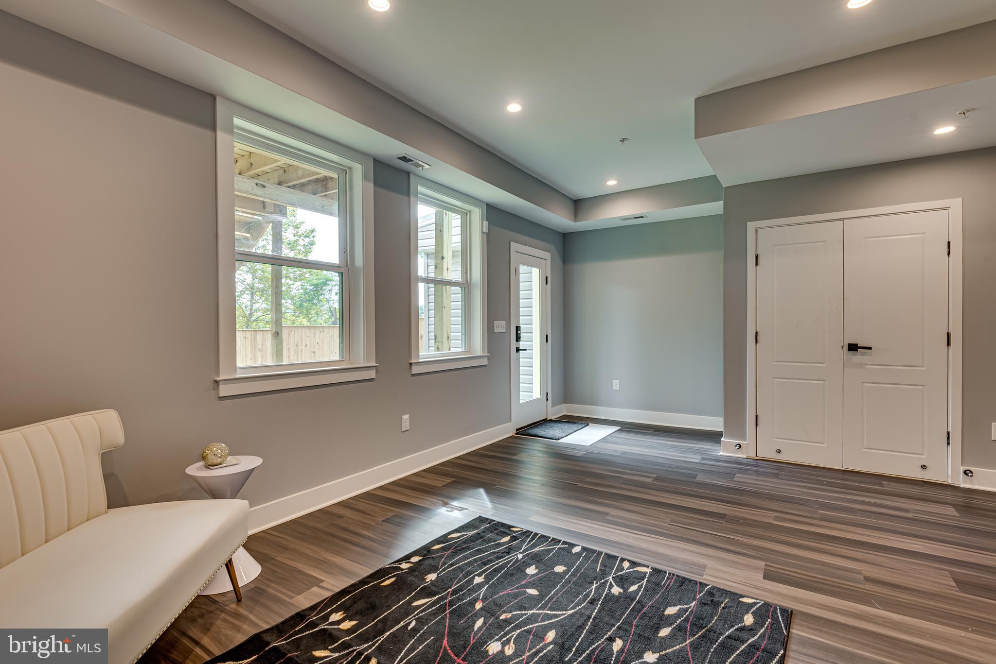 3830 First Street Southeast Washington, DC 20032 - Photo 37 of 49 a living room with furniture and a window