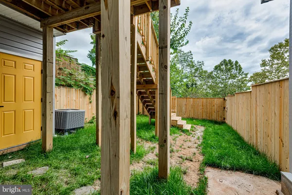 a view of a backyard of the house