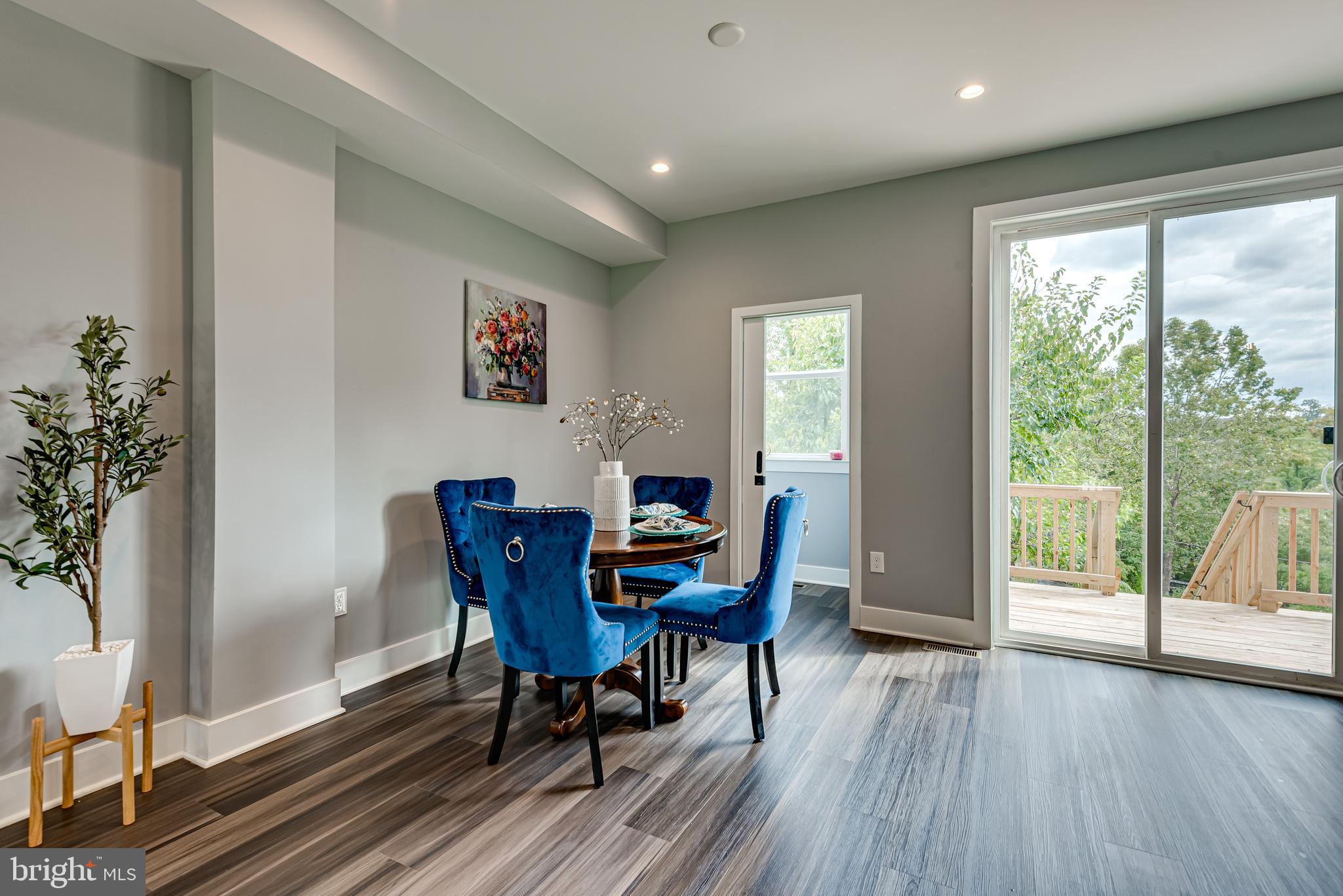 3830 First Street Southeast Washington, DC 20032 - Photo 9 of 49 a view of a dining room with furniture window and wooden floor