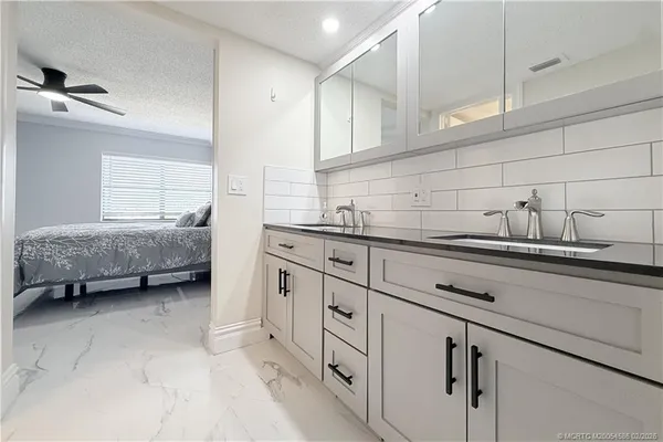 a utility room with cabinets