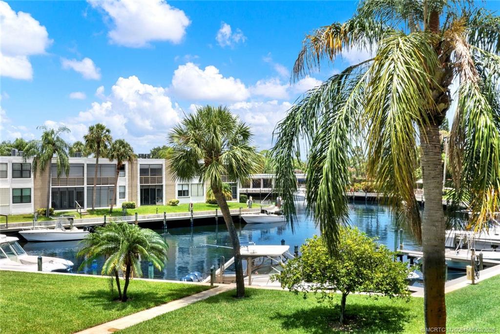 1950 Southwest Palm City Road, Unit 3309 Stuart, FL 34994 - Photo 29 of 32 a view of yard with swimming pool and patio