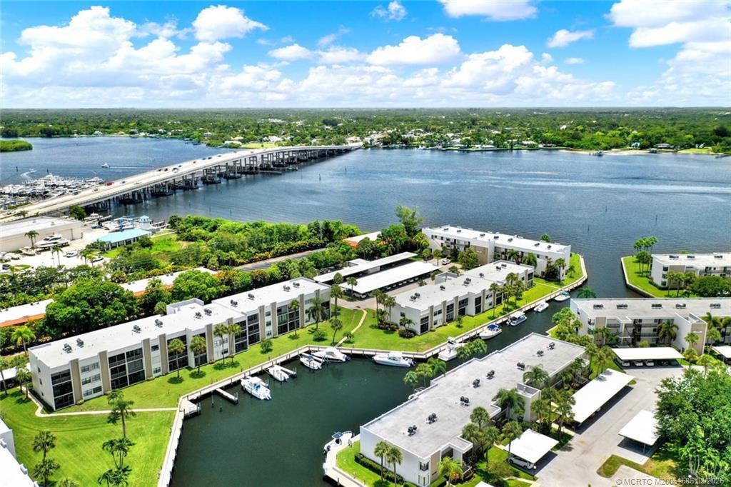 1950 Southwest Palm City Road, Unit 3309 Stuart, FL 34994 - Photo 32 of 32 a view of a lake with a mountain