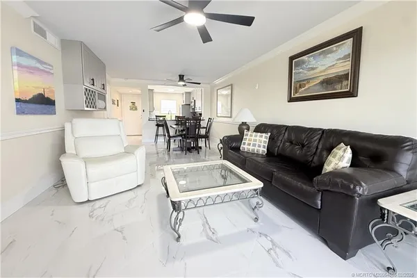 a living room with furniture and a couch