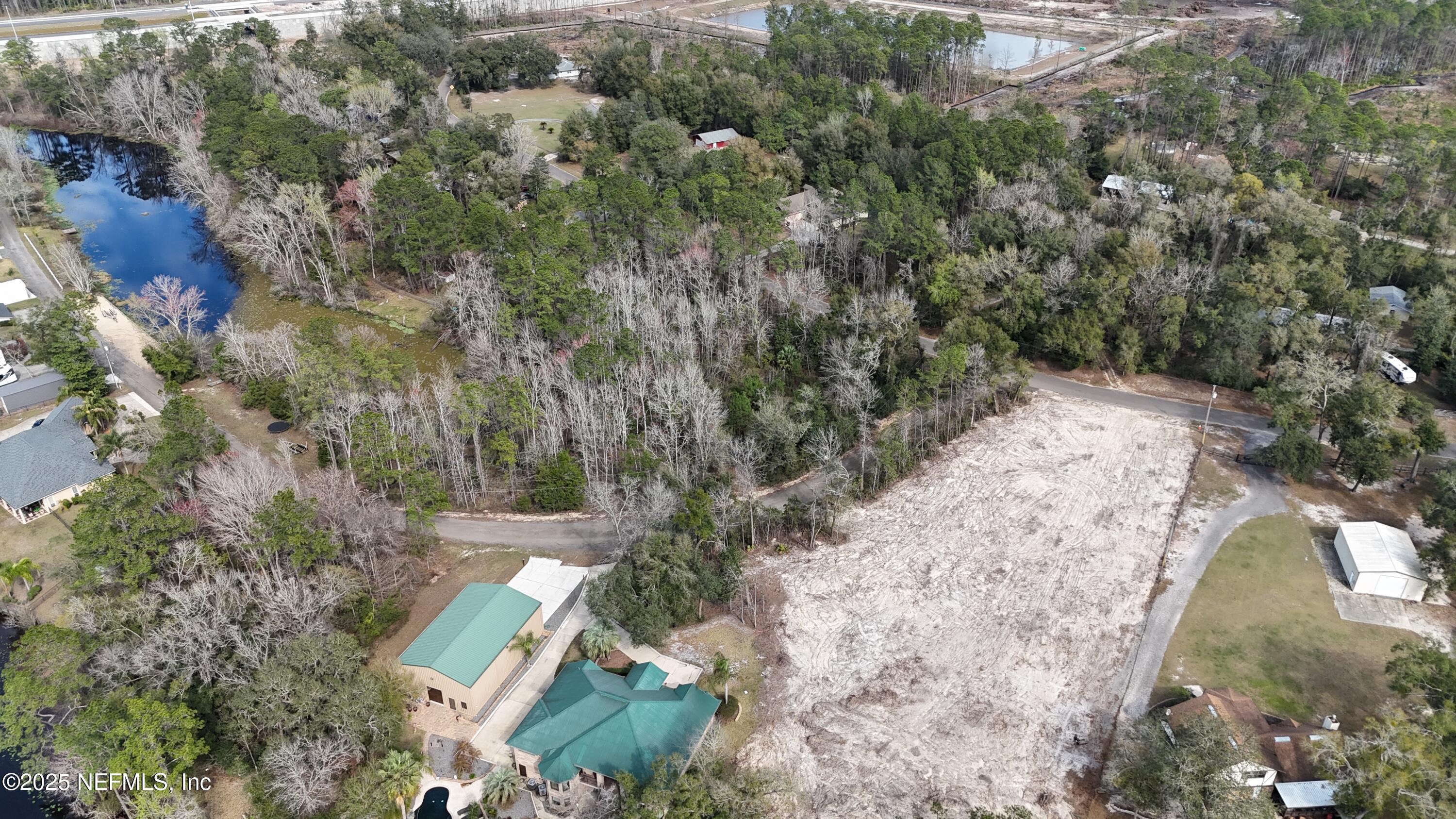 2170 Winchester Road Green Cove Springs, FL 32043 - Photo 12 of 39 an aerial view of residential house with outdoor space