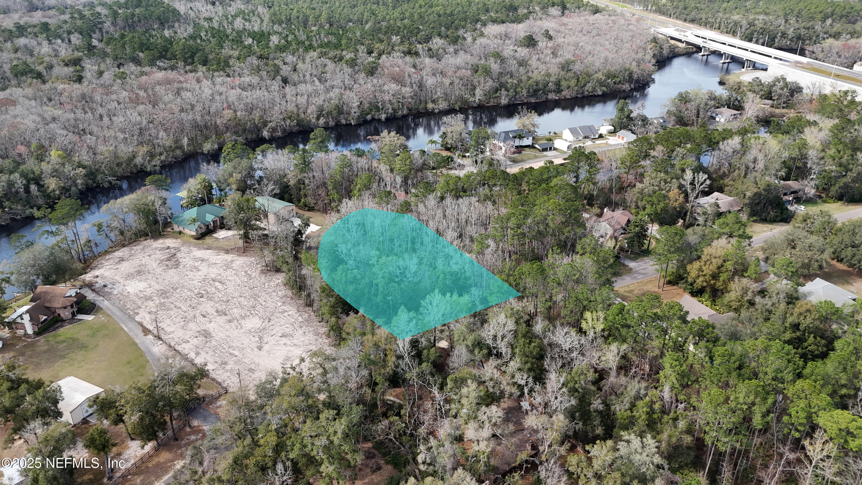2170 Winchester Road Green Cove Springs, FL 32043 - Photo 19 of 39 a view of a lake with a park