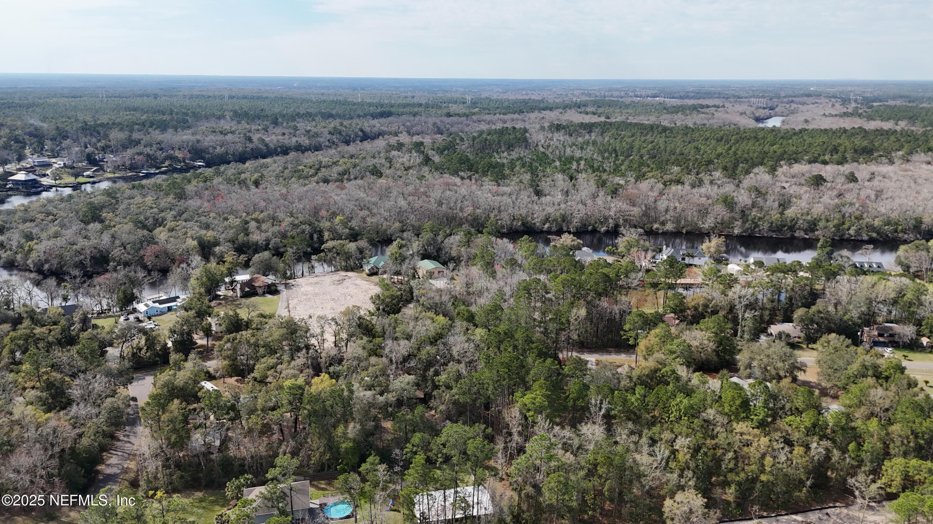2170 Winchester Road Green Cove Springs, FL 32043 - Photo 20 of 39 an aerial view of house with yard and mountain view