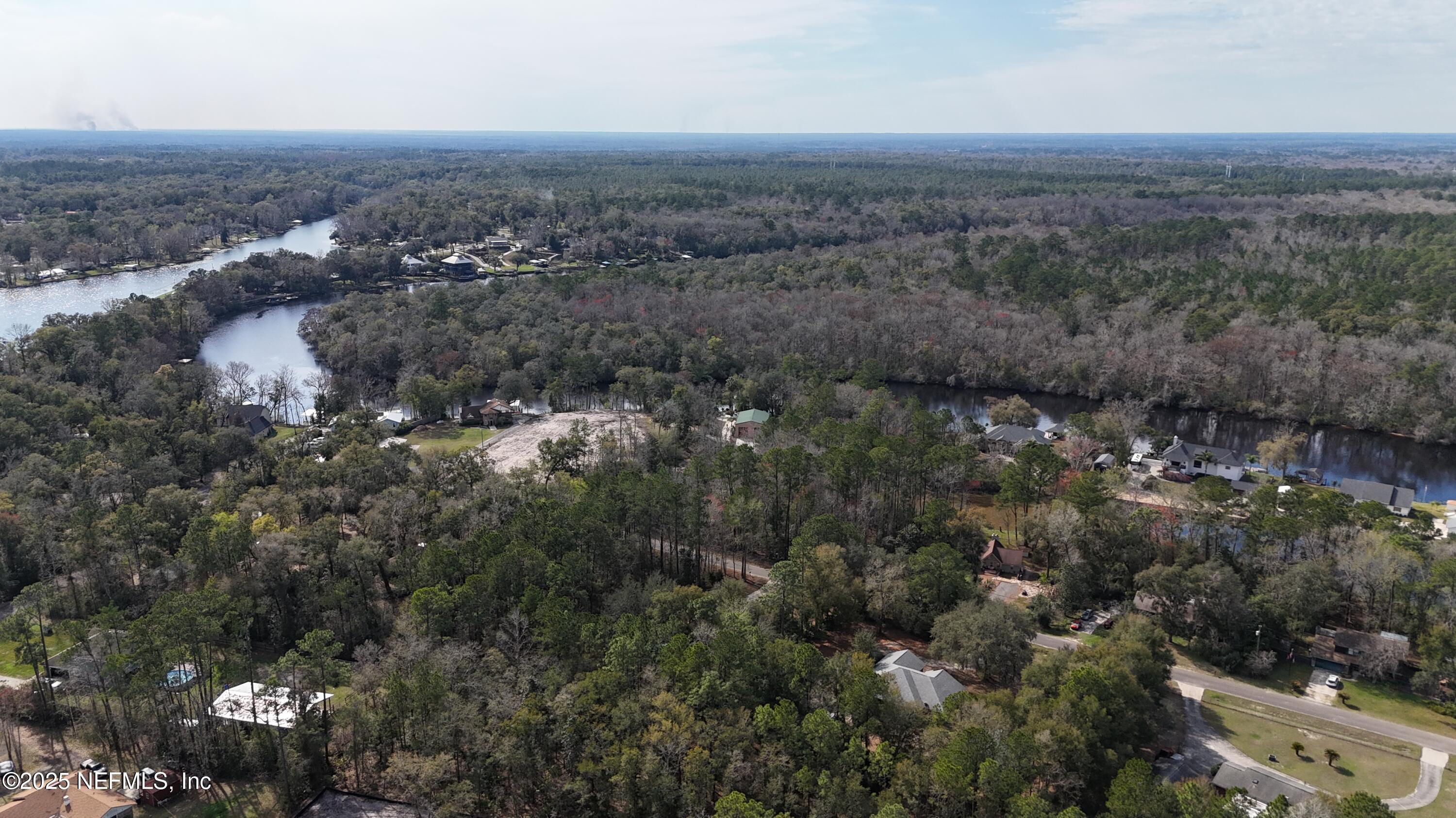 2170 Winchester Road Green Cove Springs, FL 32043 - Photo 22 of 39 an aerial view of house with yard and mountain view