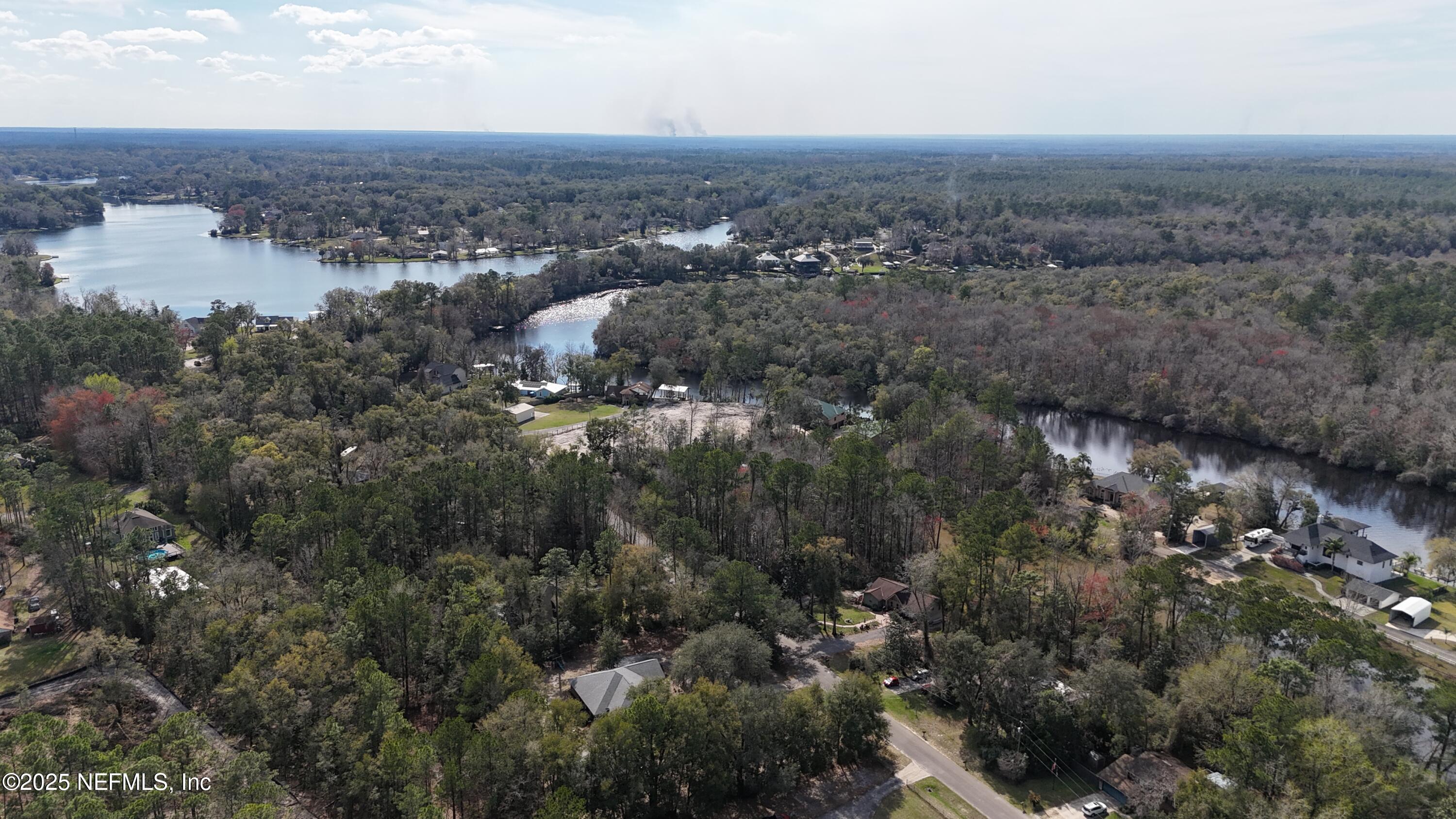 2170 Winchester Road Green Cove Springs, FL 32043 - Photo 24 of 39 an aerial view of house with yard and mountain view in back