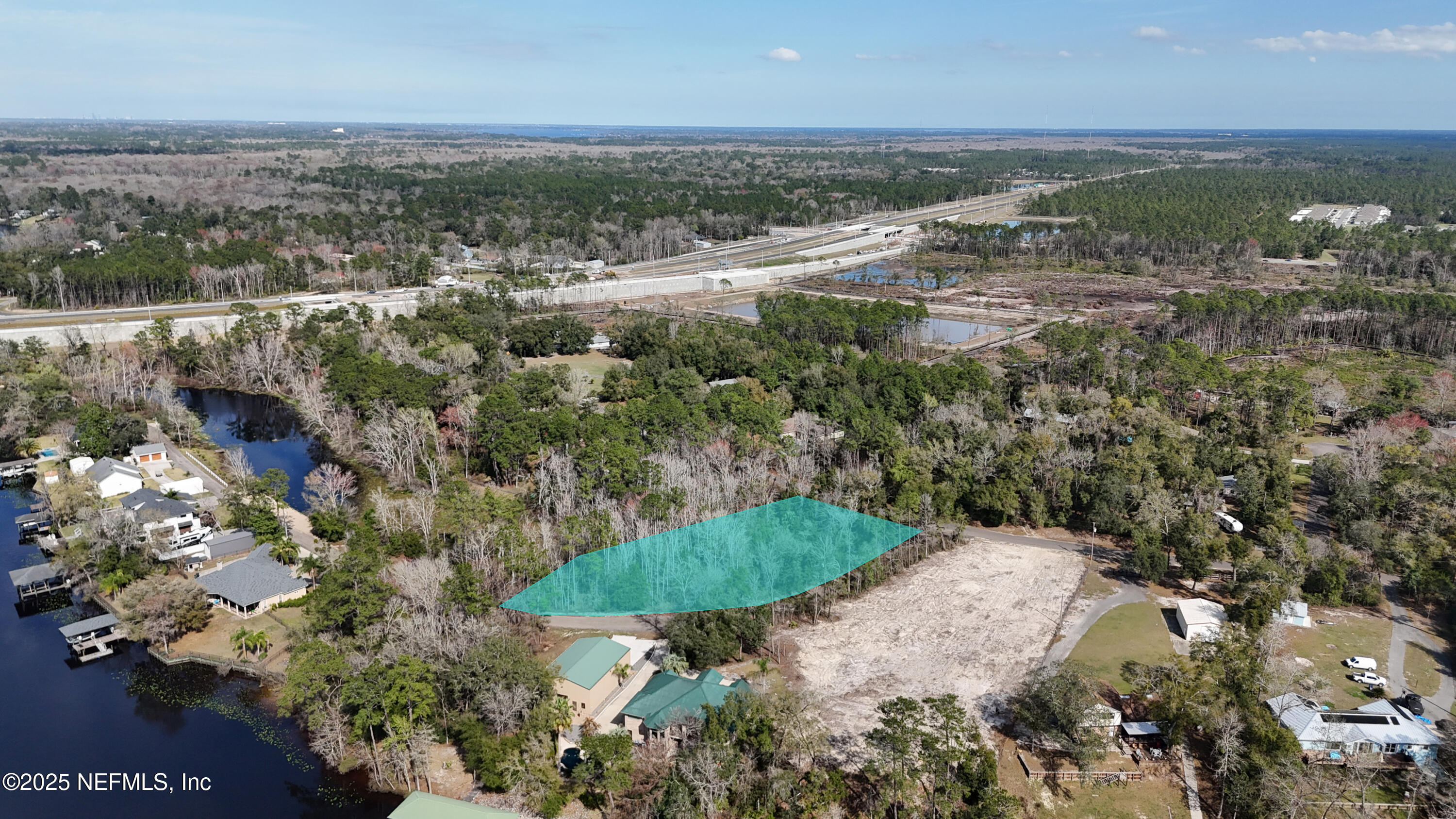 2170 Winchester Road Green Cove Springs, FL 32043 - Photo 35 of 39 a view of a lake with outdoor space