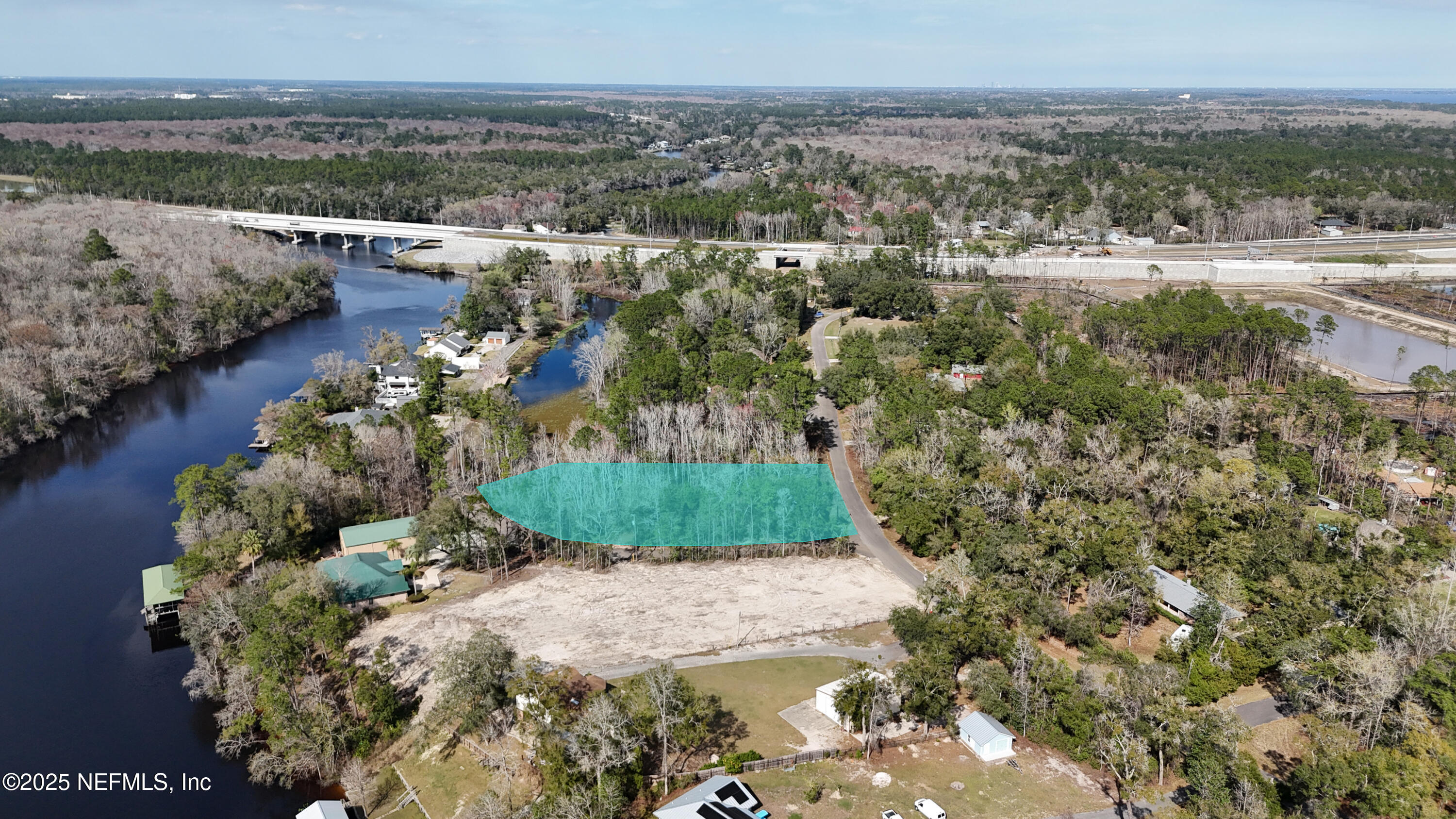 2170 Winchester Road Green Cove Springs, FL 32043 - Photo 37 of 39 a view of a lake with a city