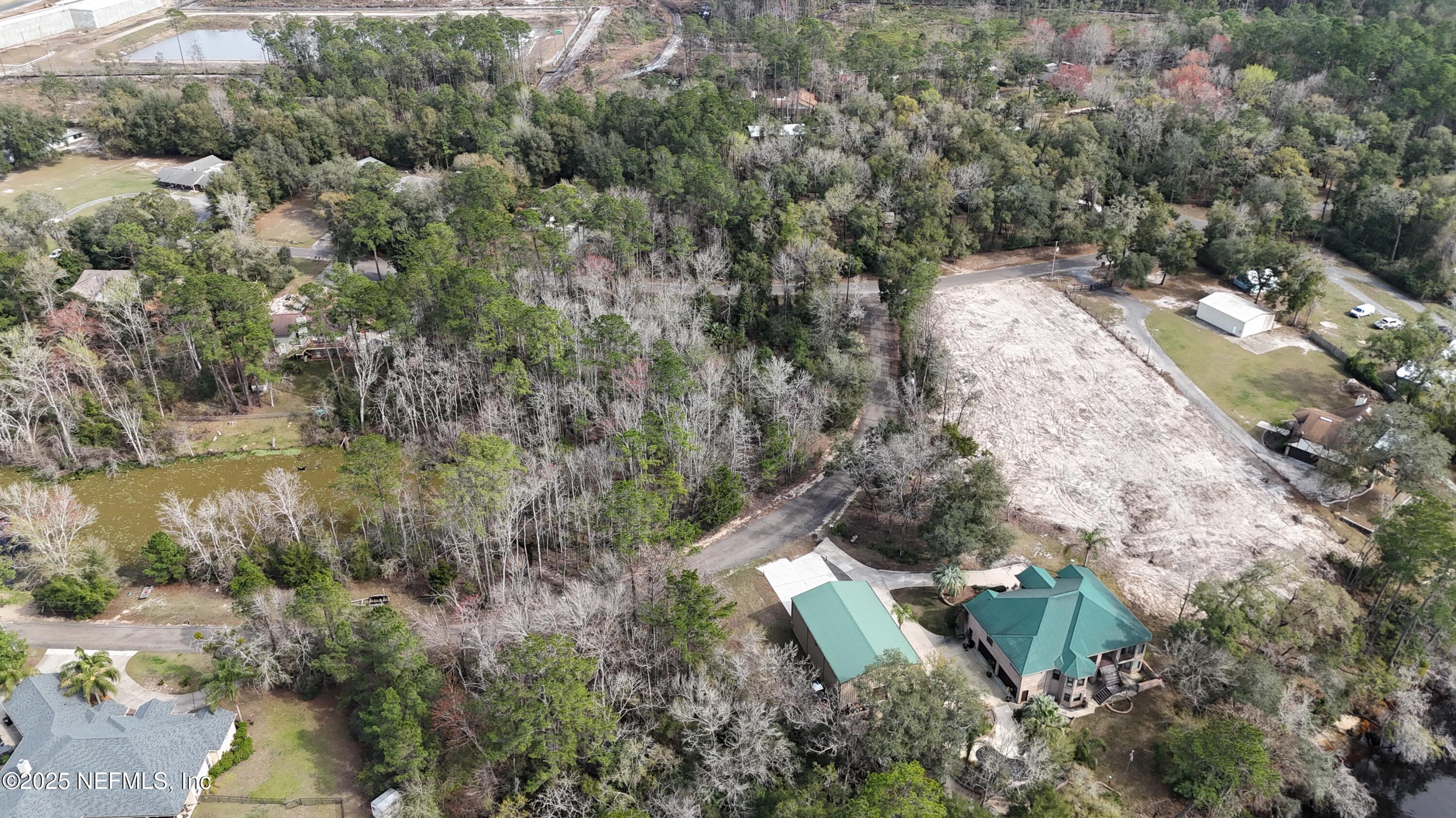 2170 Winchester Road Green Cove Springs, FL 32043 - Photo 10 of 39 an aerial view of a house with a yard