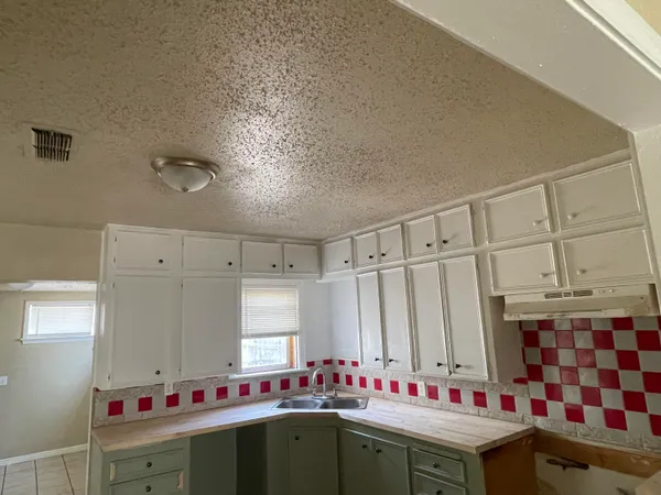 a view of a livingroom and window