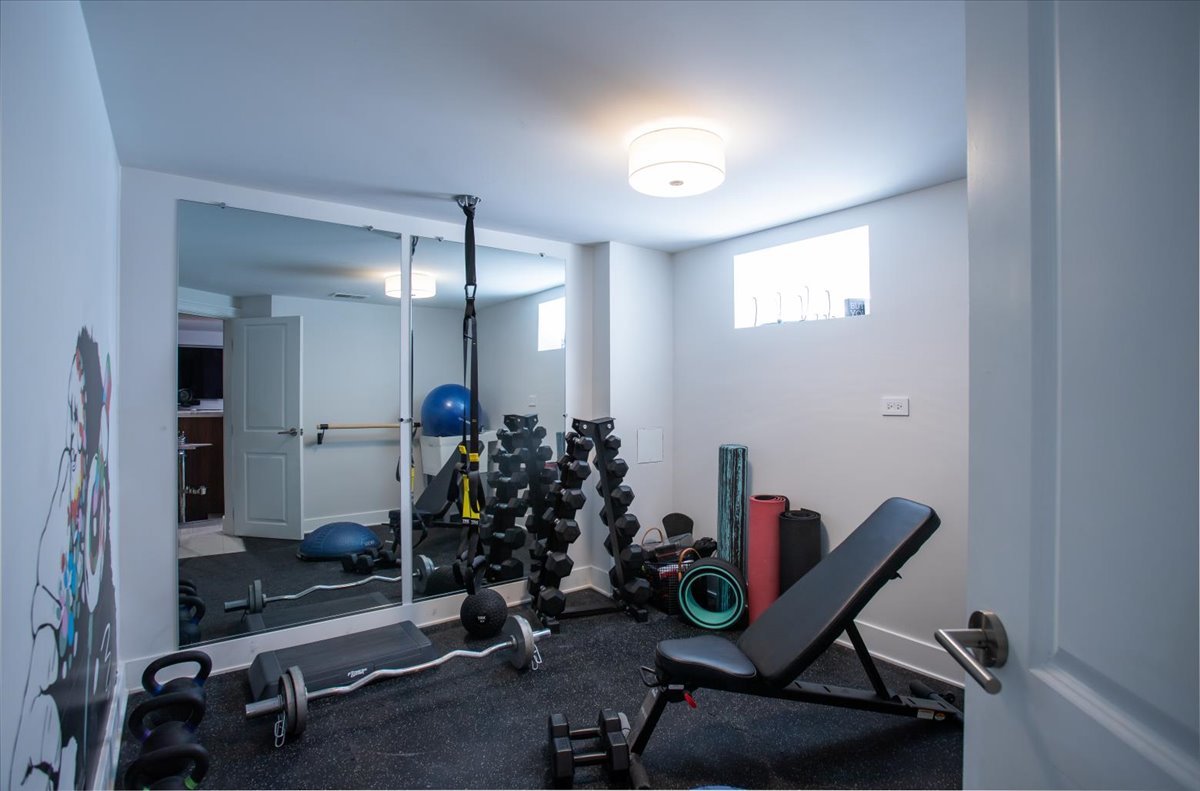 305 Clinton Avenue Elmhurst, IL 60126 - Photo 24 of 31 a view of a room with gym equipment