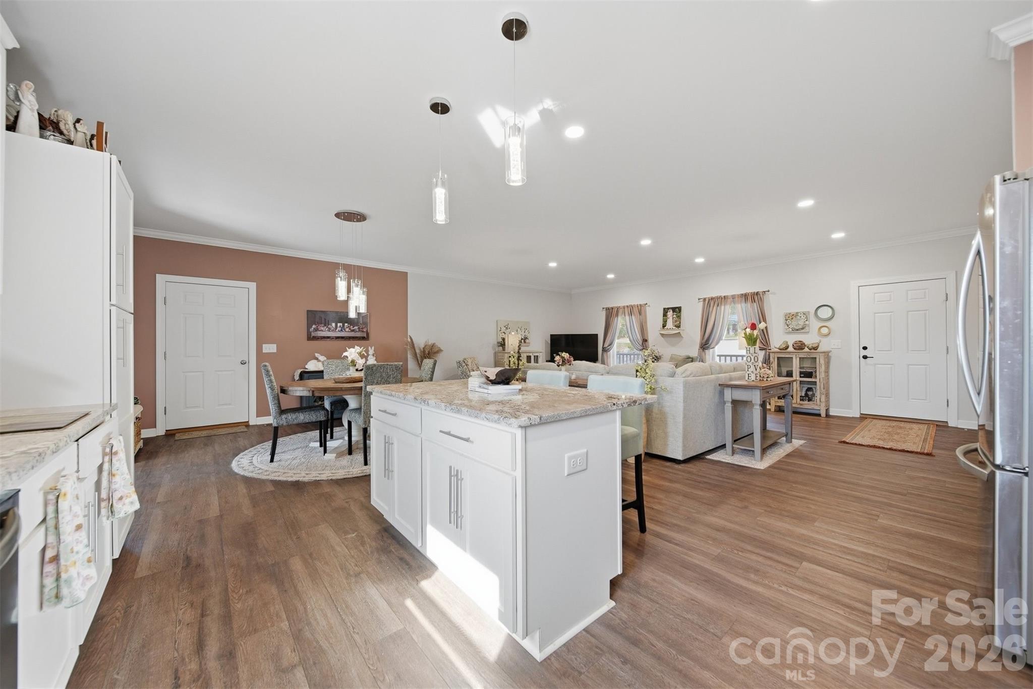 976 Amherst Road Morganton, NC 28655 - Photo 15 of 38 a open kitchen with white cabinets and sink