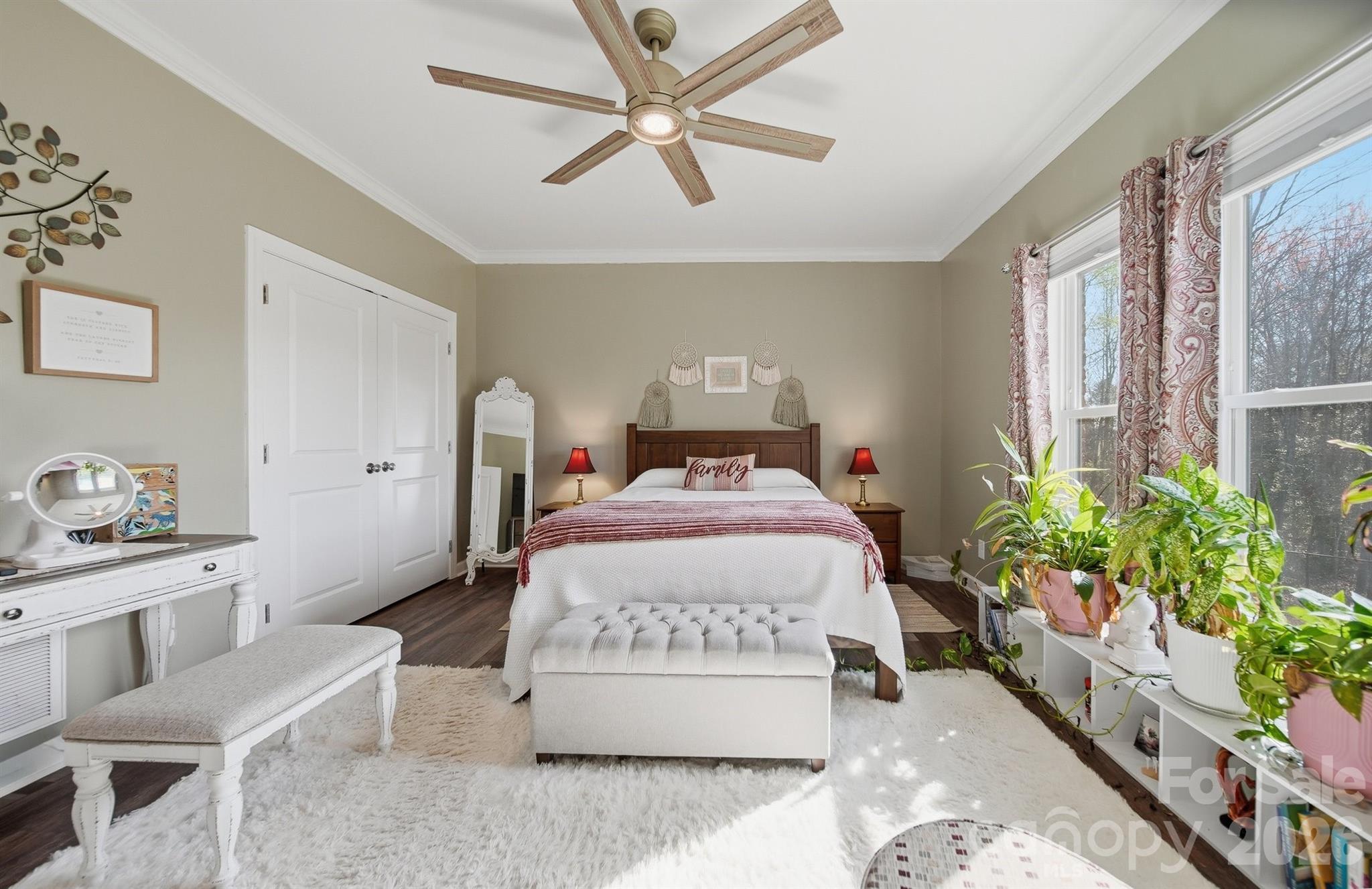 976 Amherst Road Morganton, NC 28655 - Photo 18 of 38 a bedroom with a bed table and a window
