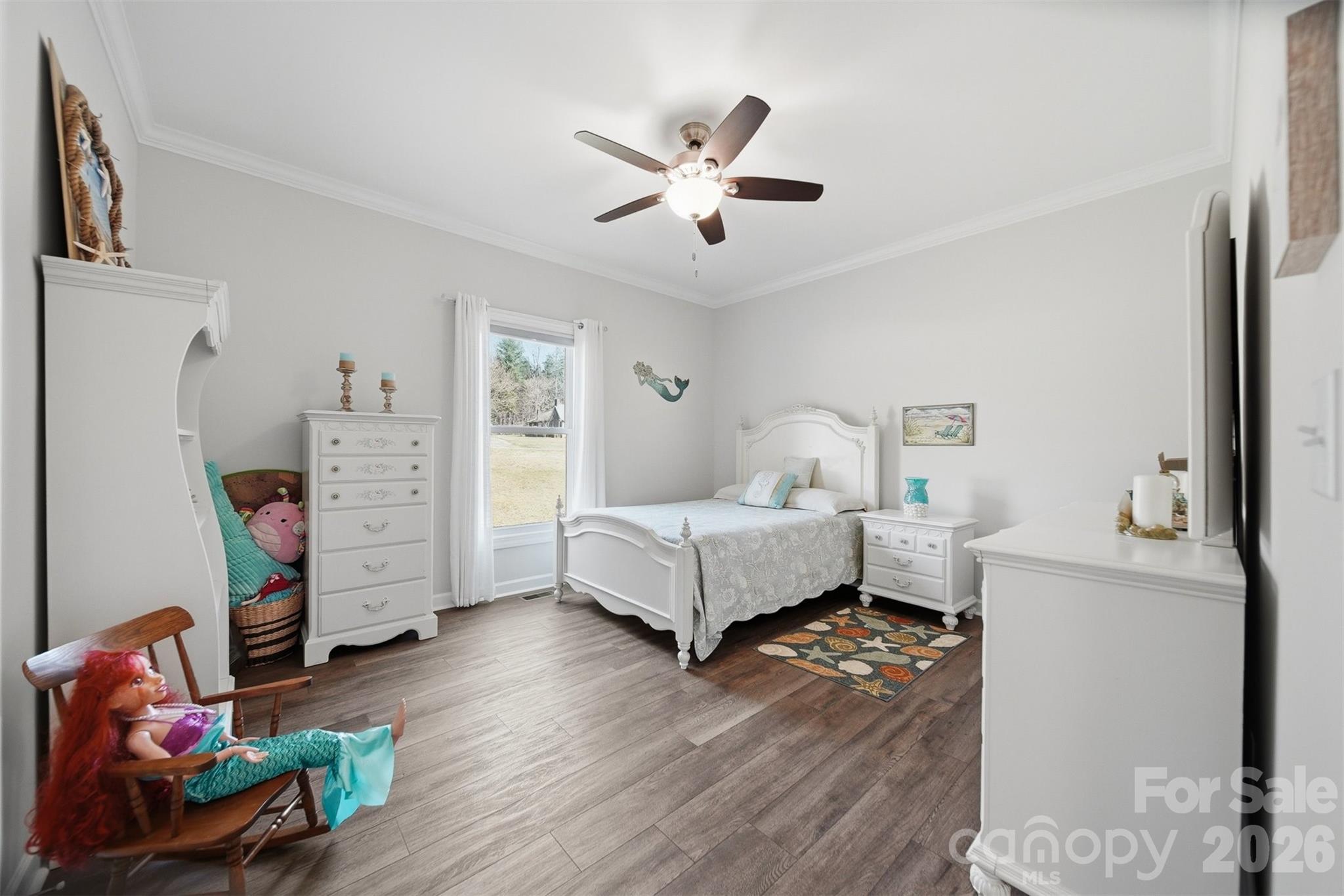976 Amherst Road Morganton, NC 28655 - Photo 20 of 38 a bedroom with furniture and a wooden floor