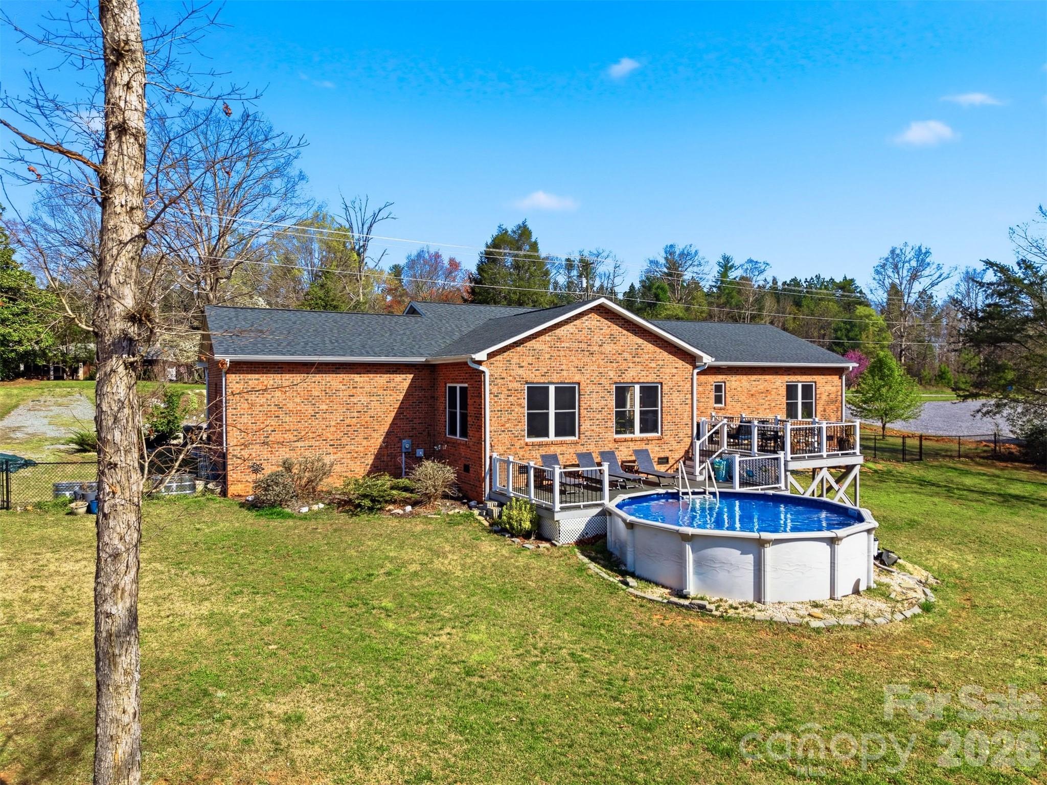 976 Amherst Road Morganton, NC 28655 - Photo 30 of 38 a view of a house with backyard and garden