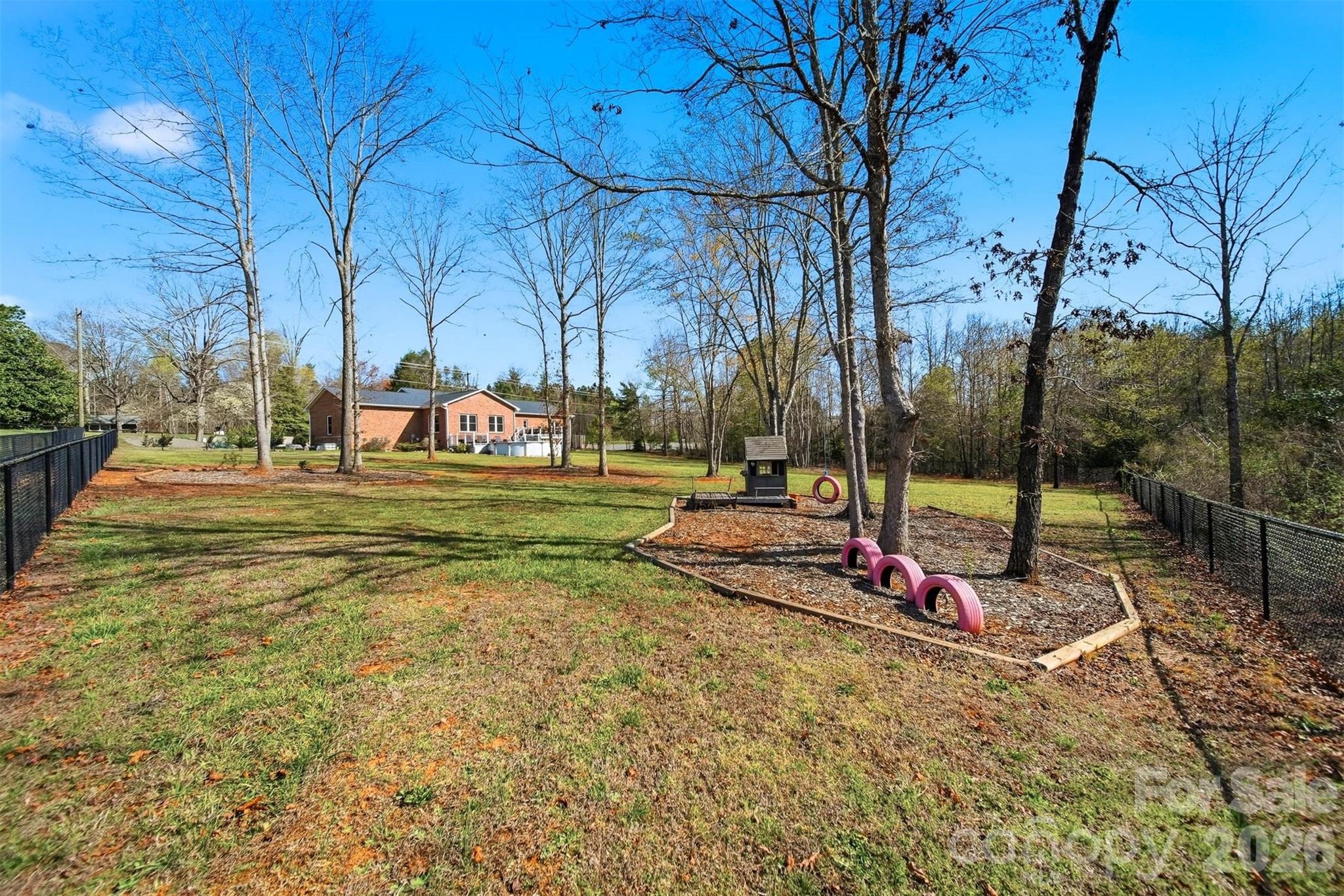 976 Amherst Road Morganton, NC 28655 - Photo 31 of 38 a view of outdoor space with playground and green space