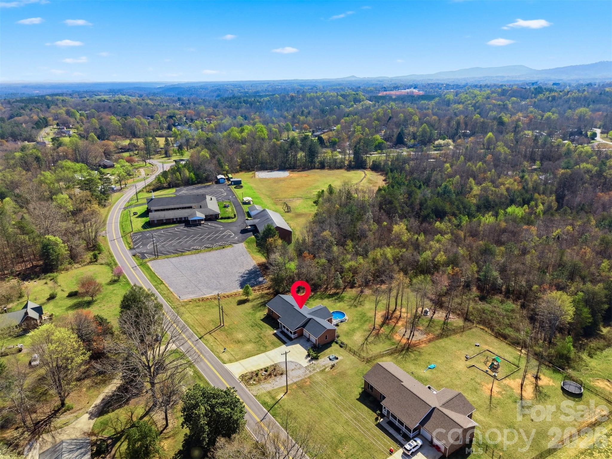 976 Amherst Road Morganton, NC 28655 - Photo 36 of 38 an aerial view of a houses with a yard