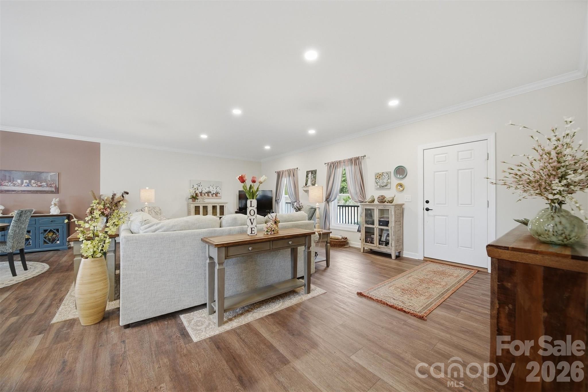 976 Amherst Road Morganton, NC 28655 - Photo 4 of 38 a living room with furniture and a wooden floor