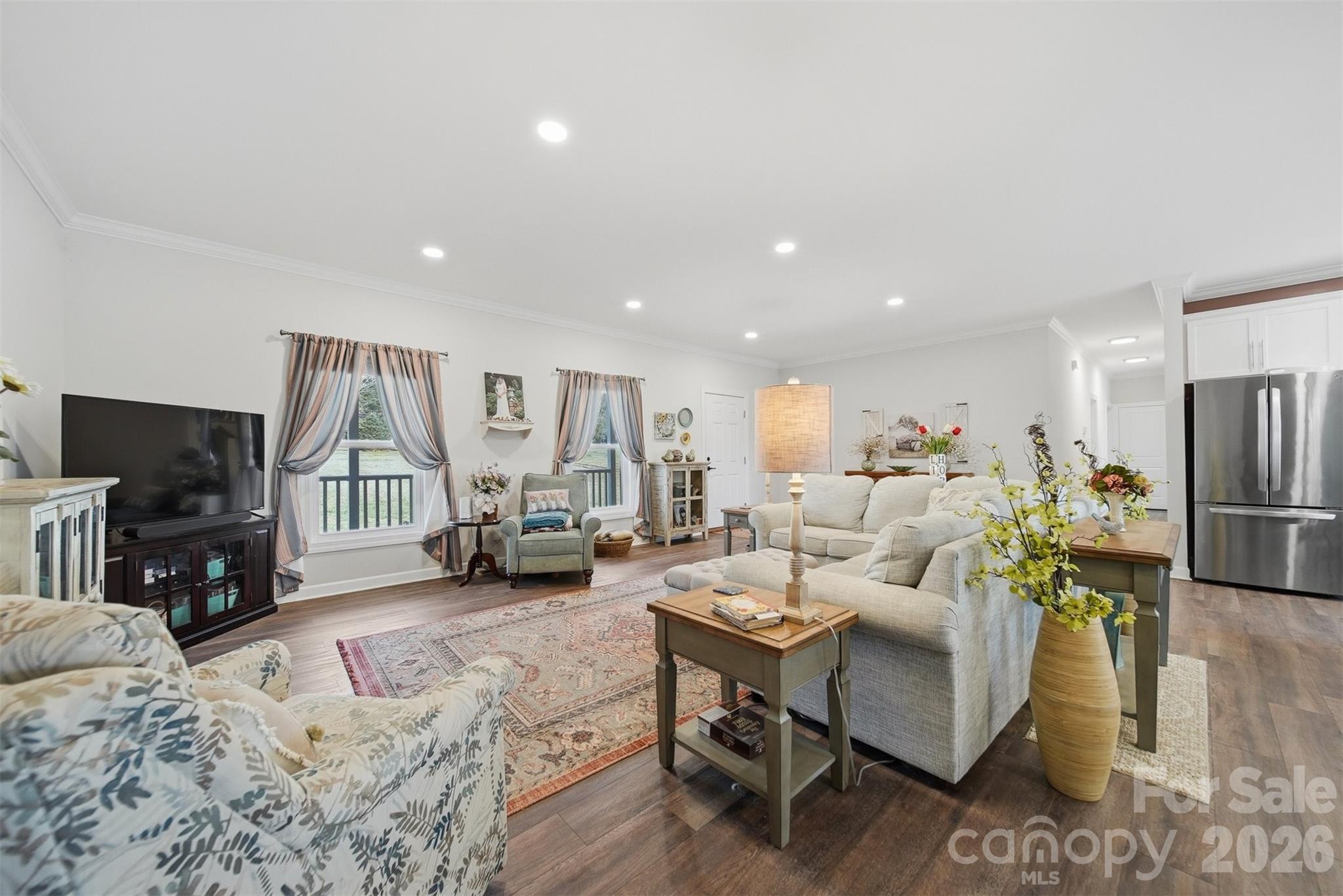 976 Amherst Road Morganton, NC 28655 - Photo 7 of 38 a living room with fireplace furniture and a flat screen tv
