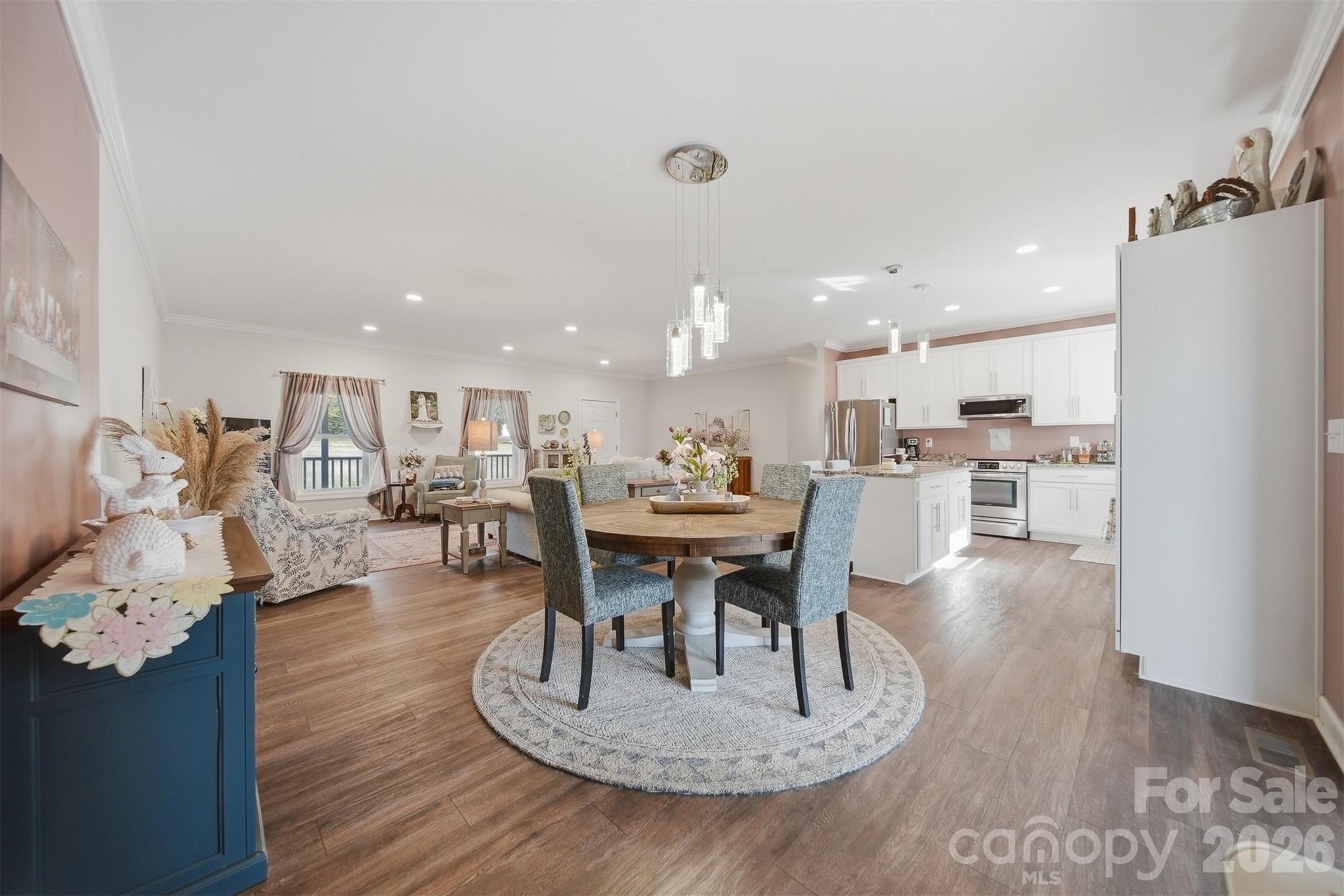 976 Amherst Road Morganton, NC 28655 - Photo 8 of 38 a dining room with furniture and wooden floor