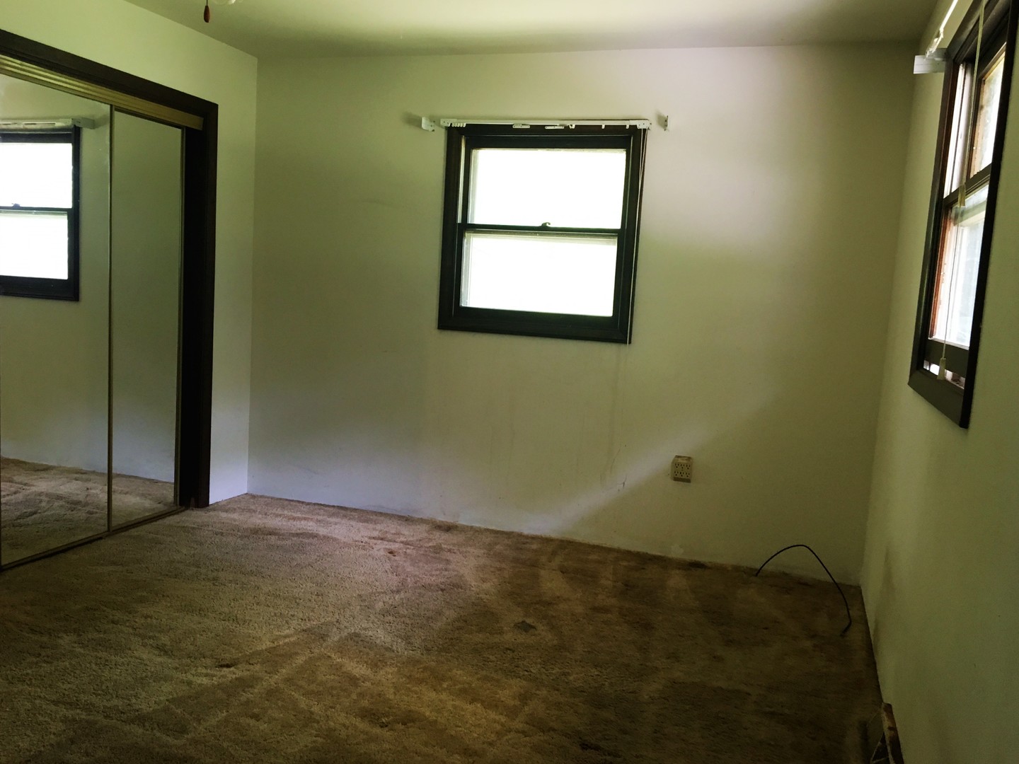6939 North Junction Road Davis Junction, IL 61020 - Photo 17 of 31 a view of an empty room with a window