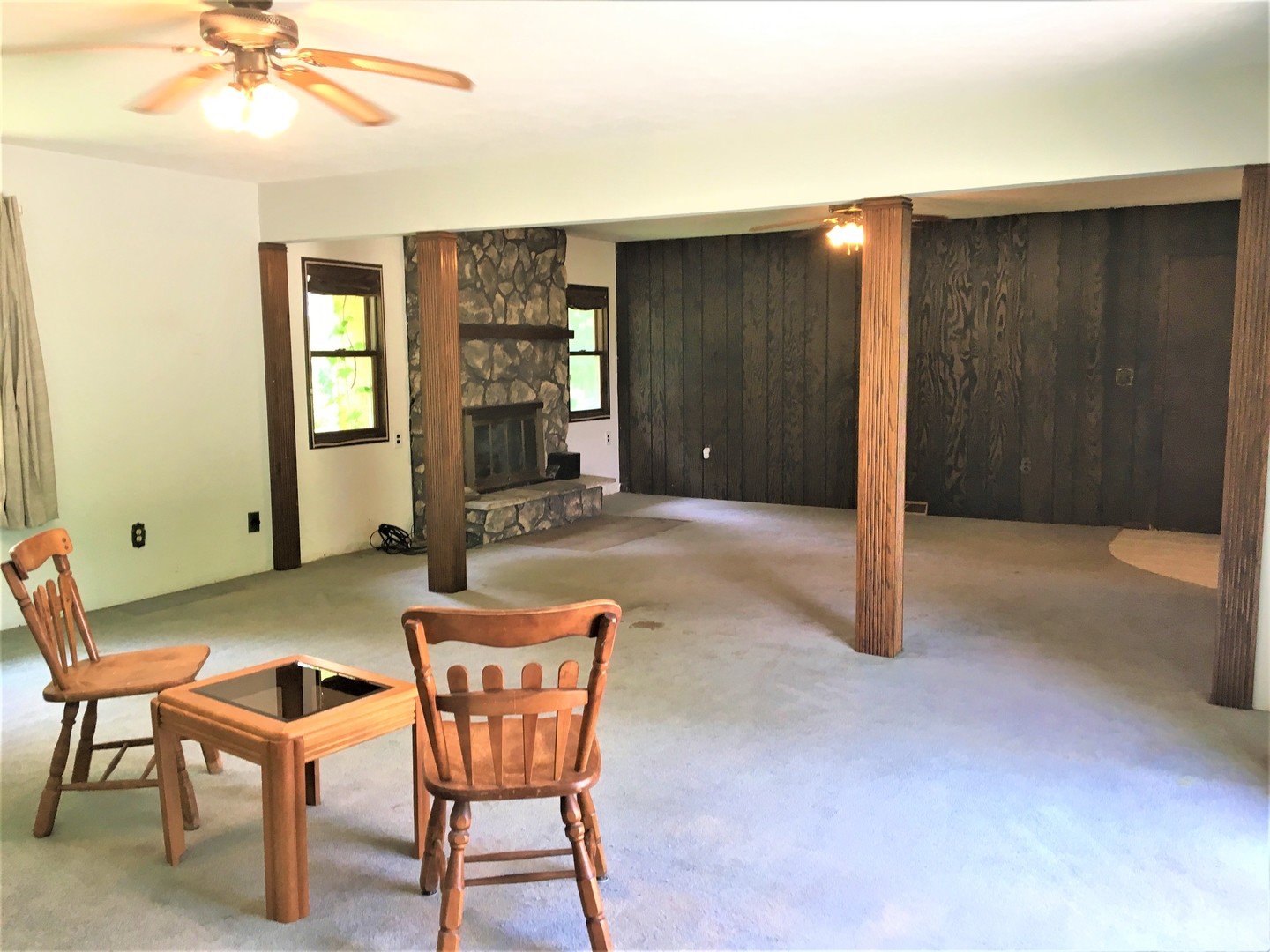 6939 North Junction Road Davis Junction, IL 61020 - Photo 10 of 31 a view of a livingroom with furniture and chandelier