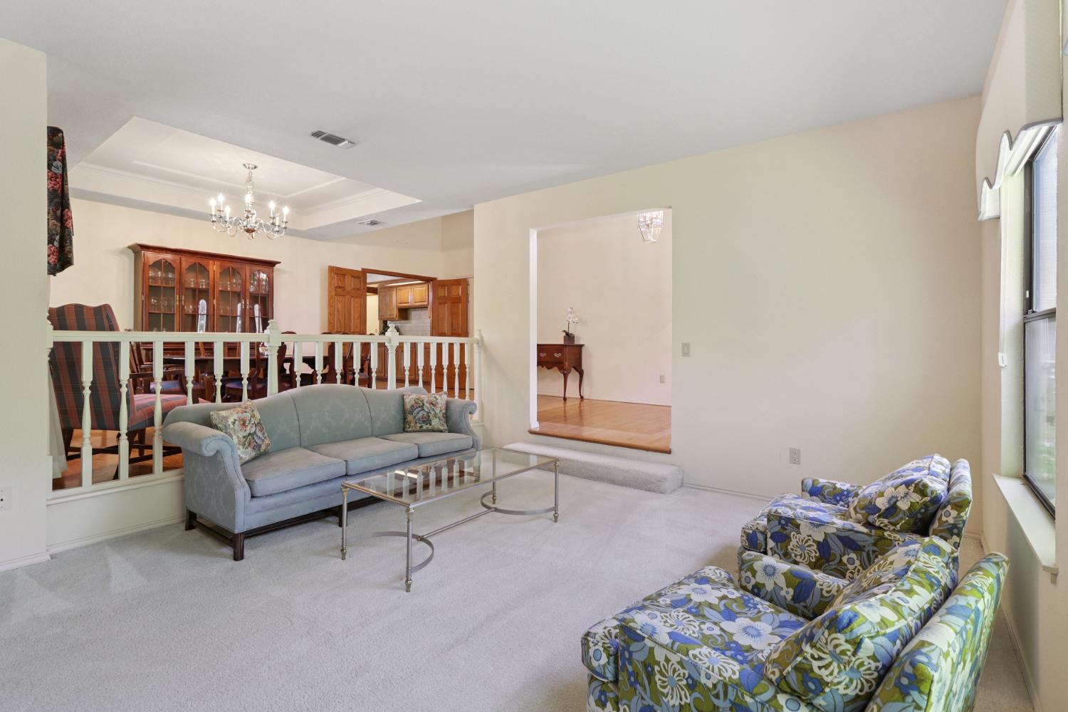 6798 Terreno Drive Rancho Murieta, CA 95683 - Photo 16 of 63 a living room with furniture and a window