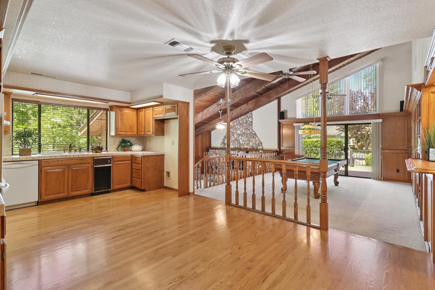 6798 Terreno Drive Rancho Murieta, CA 95683 - Photo 17 of 63 a view of a kitchen with a sink and a large window