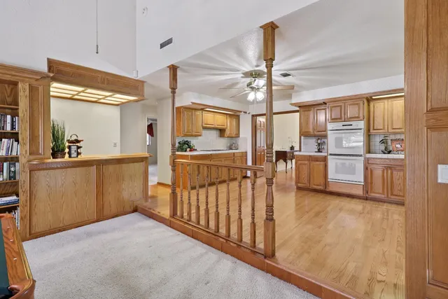 a room with lots of furniture and windows