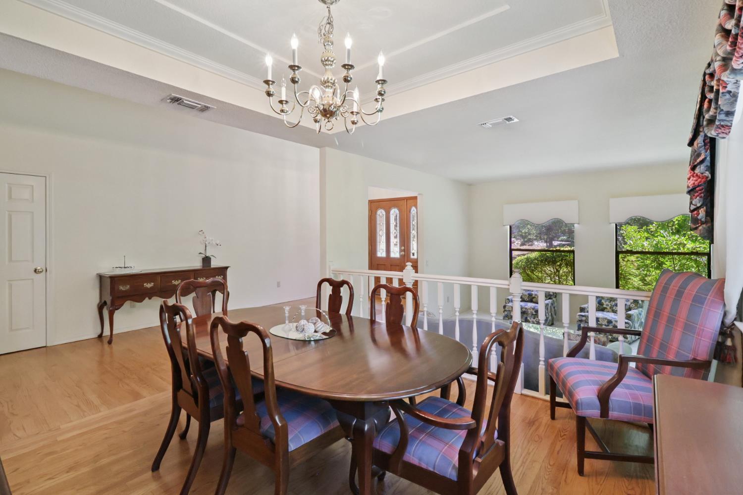 6798 Terreno Drive Rancho Murieta, CA 95683 - Photo 10 of 63 a view of a dining room with furniture window and outside view