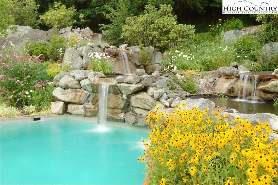 117 Ridge Drive Linville, NC 28646 - Photo 28 of 32 a view of yard with swimming pool