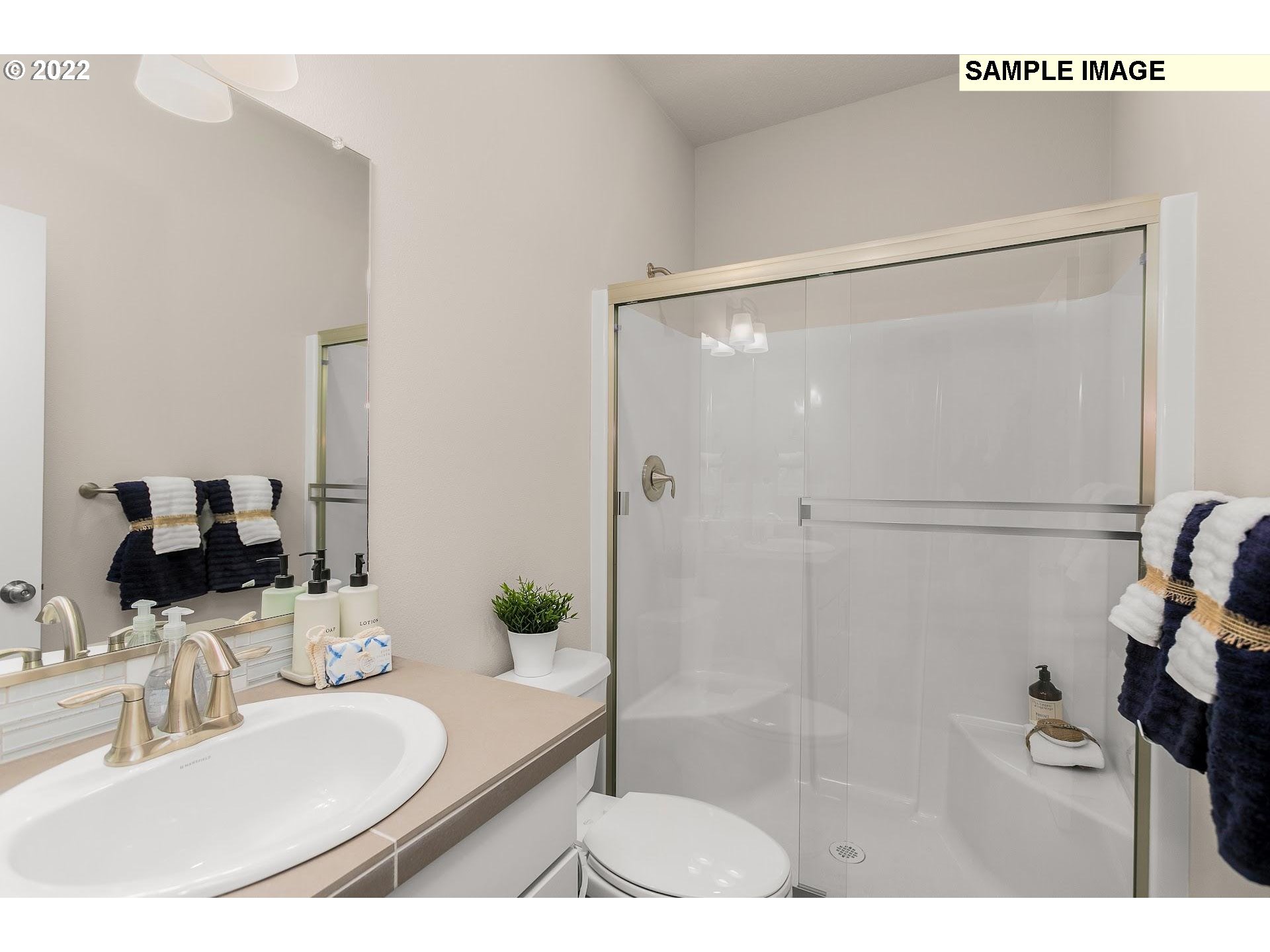 37413 Coho Street Sandy, OR 97055 - Photo 14 of 23 a bathroom with a sink and a mirror