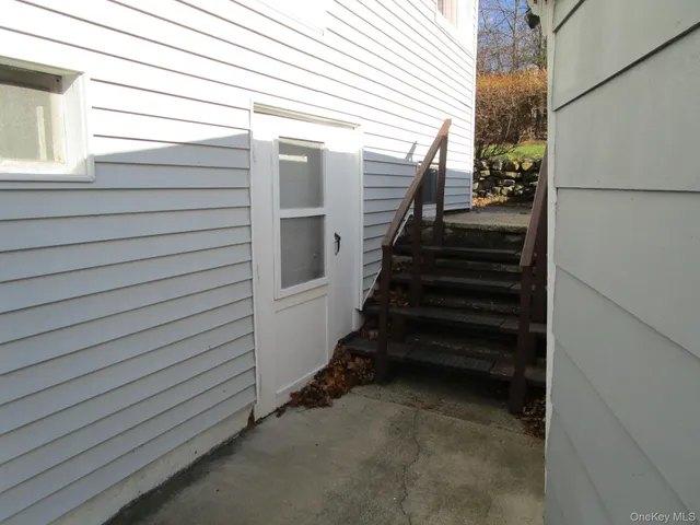 a view of a room with a hallway